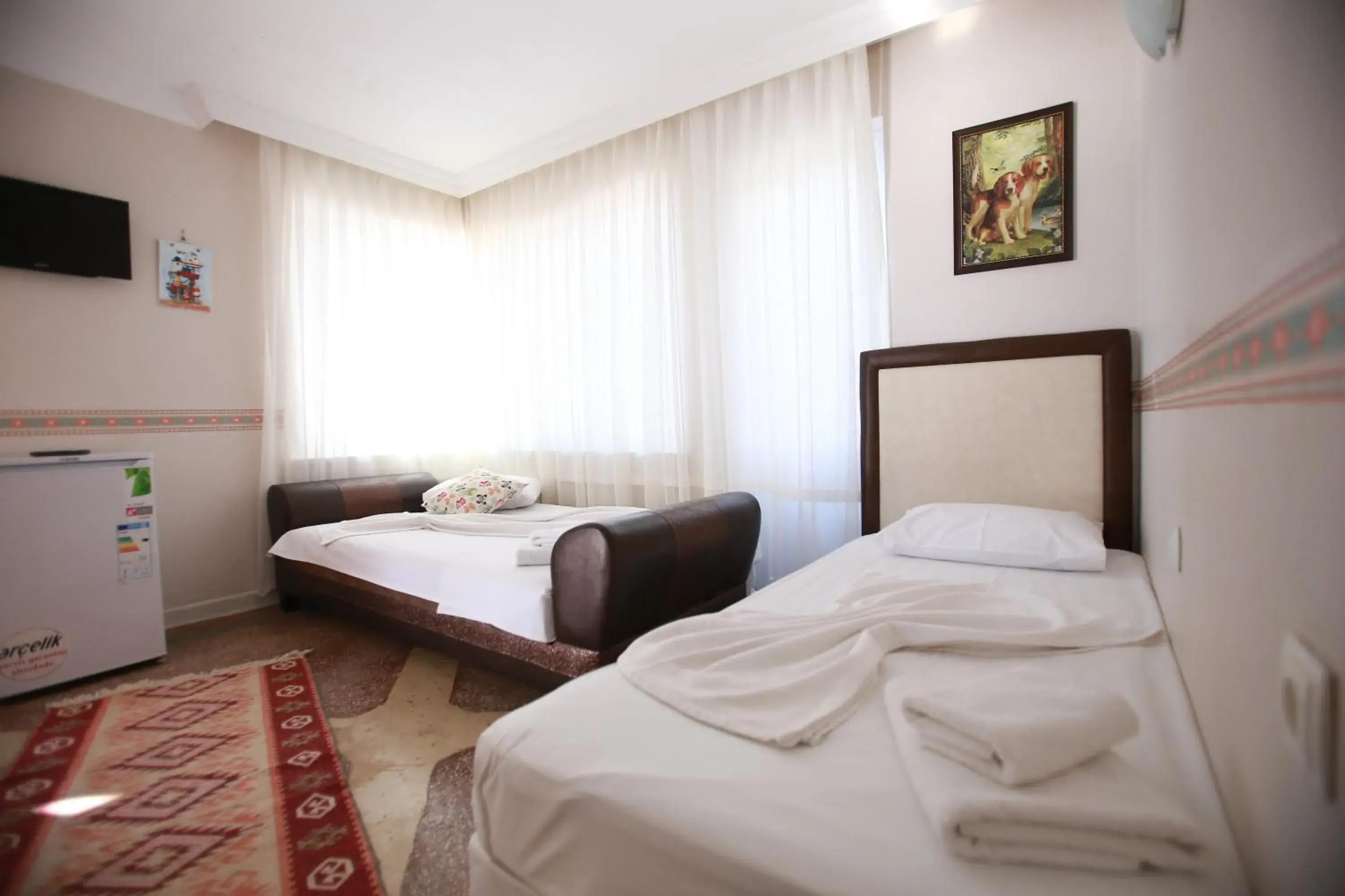 Photo of the whole room, Bed in Tunc Hotel Photo of the whole room, Bed in Tunc Hotel