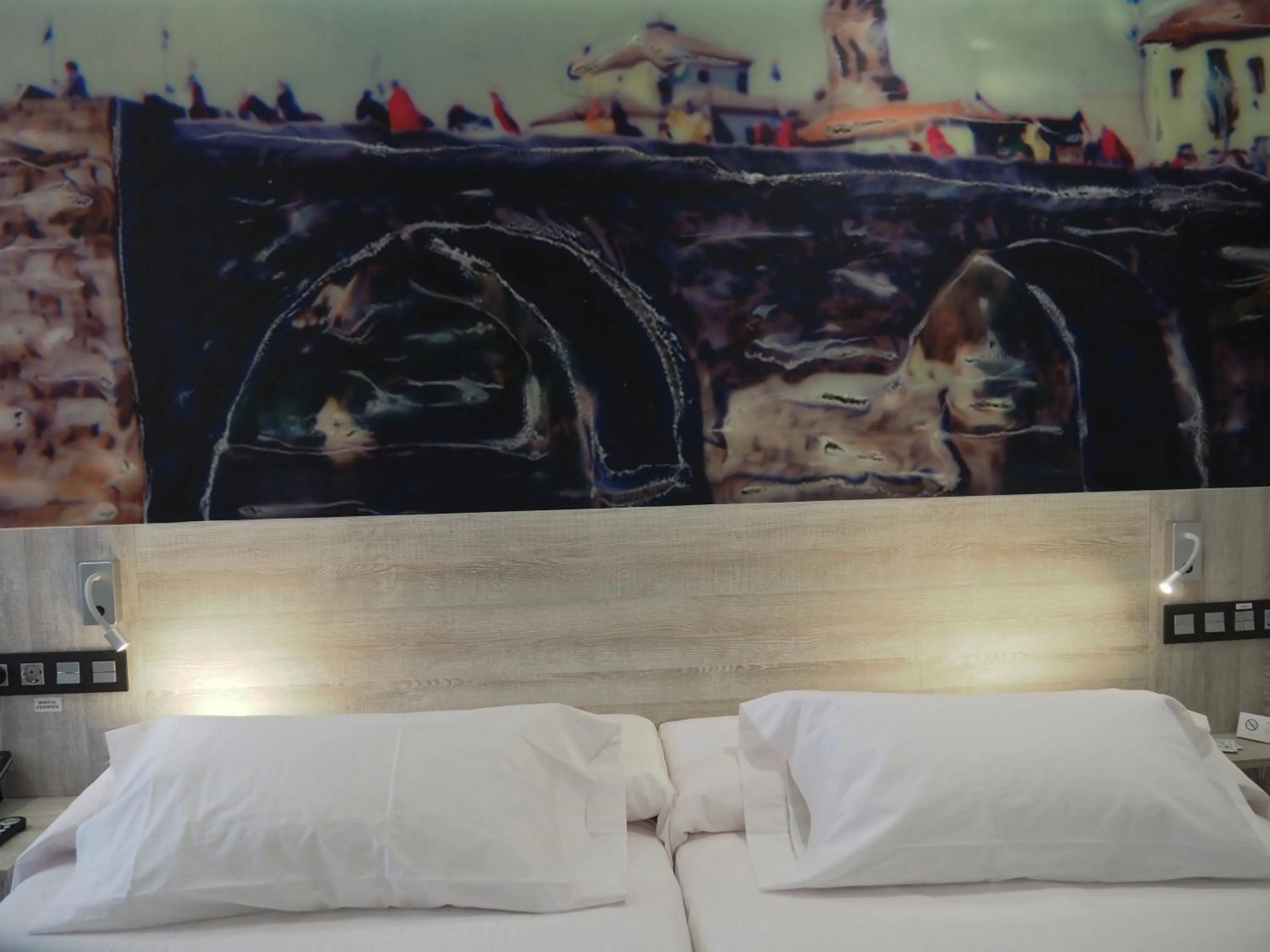 Bed in Hostal Don Suero de Quiñones