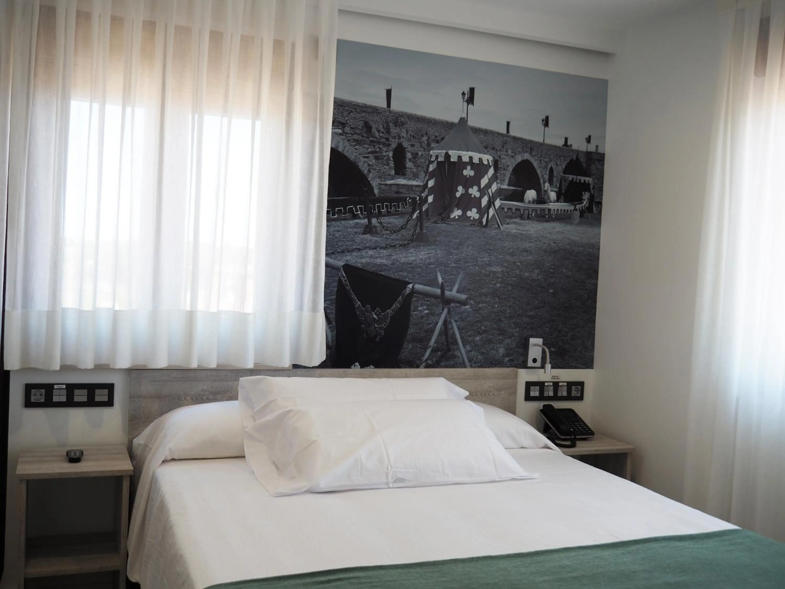 Bed in Hostal Don Suero de Quiñones