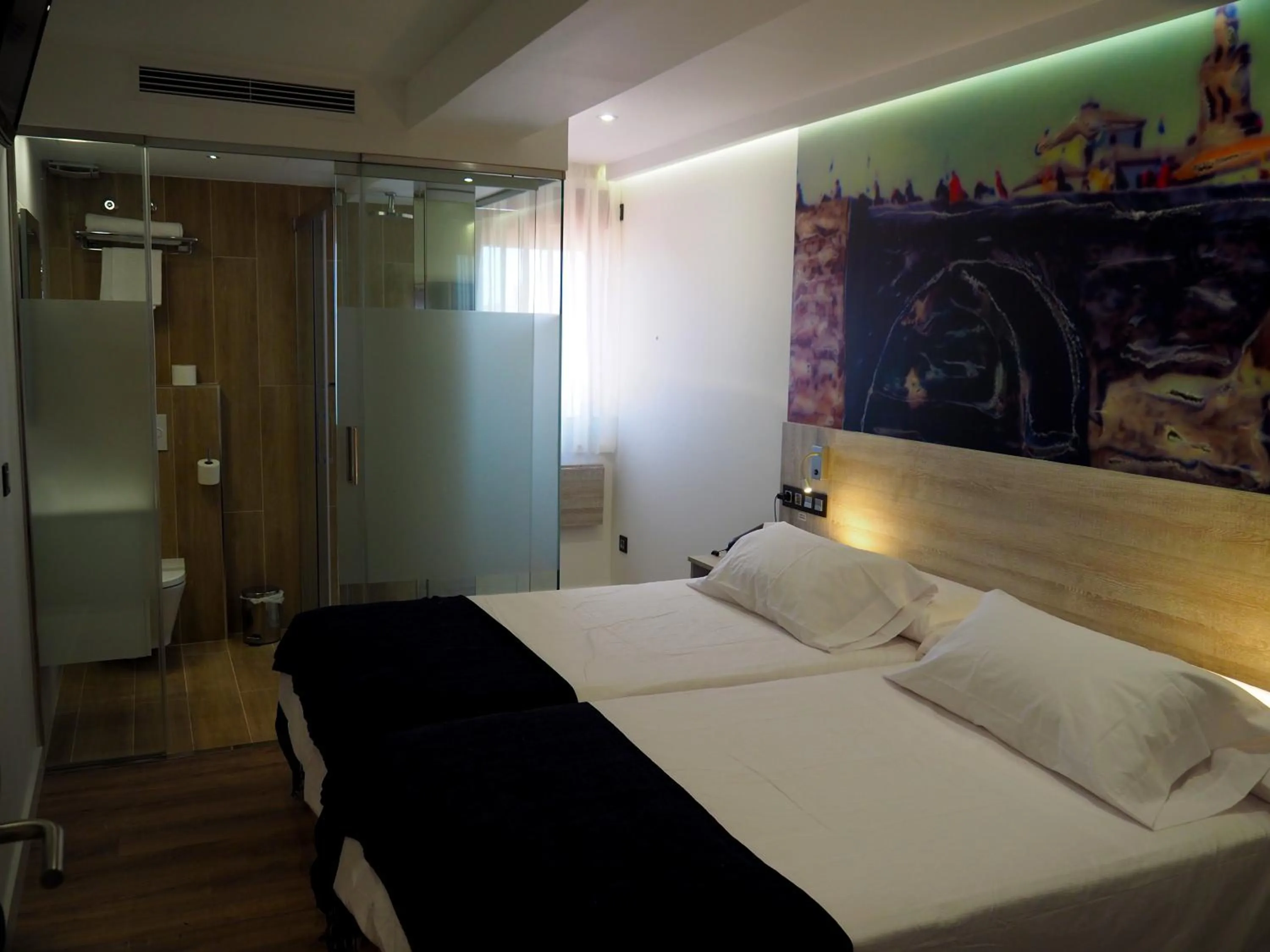 Bed in Hostal Don Suero de Quiñones