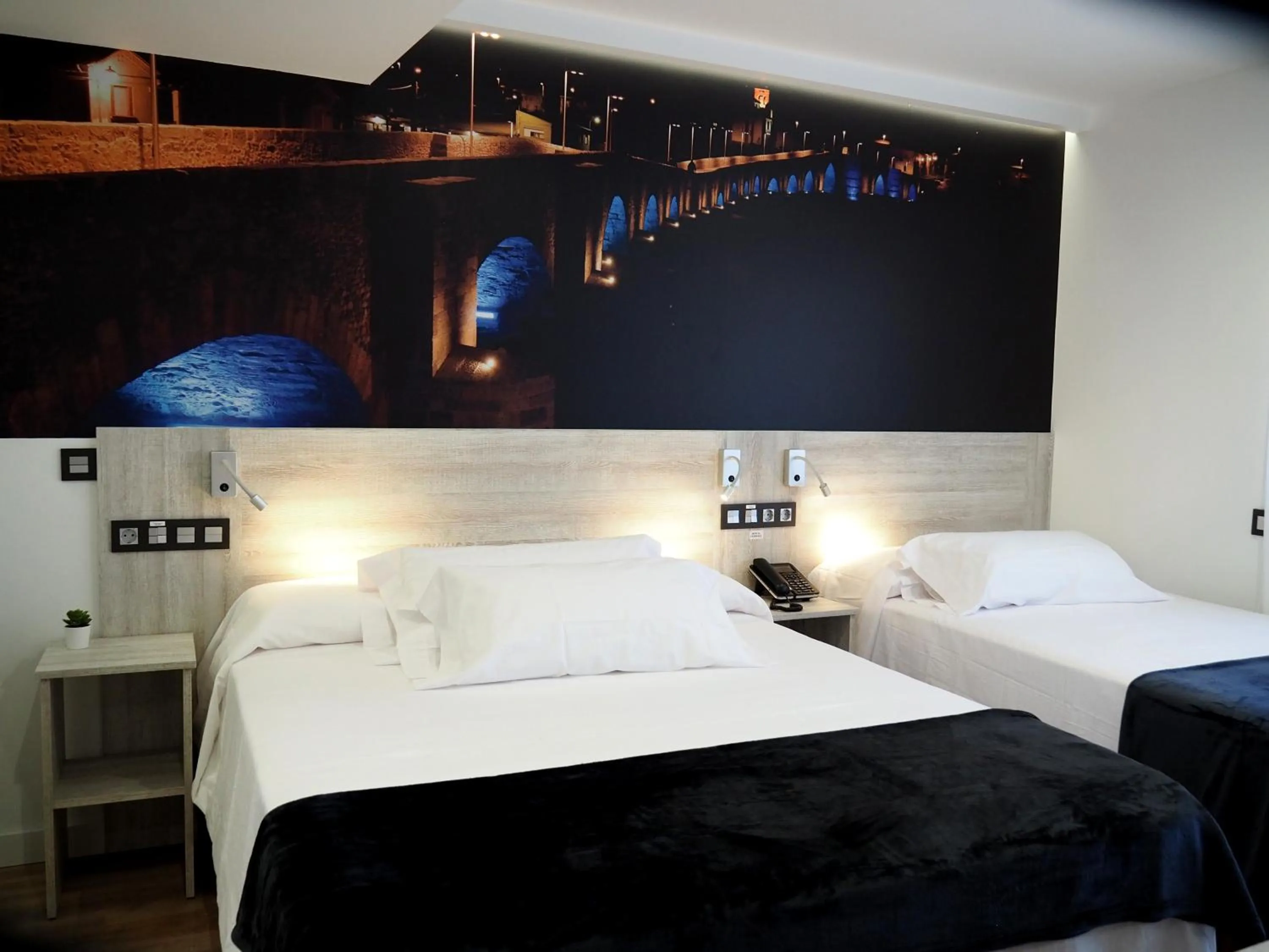 Bed in Hostal Don Suero de Quiñones