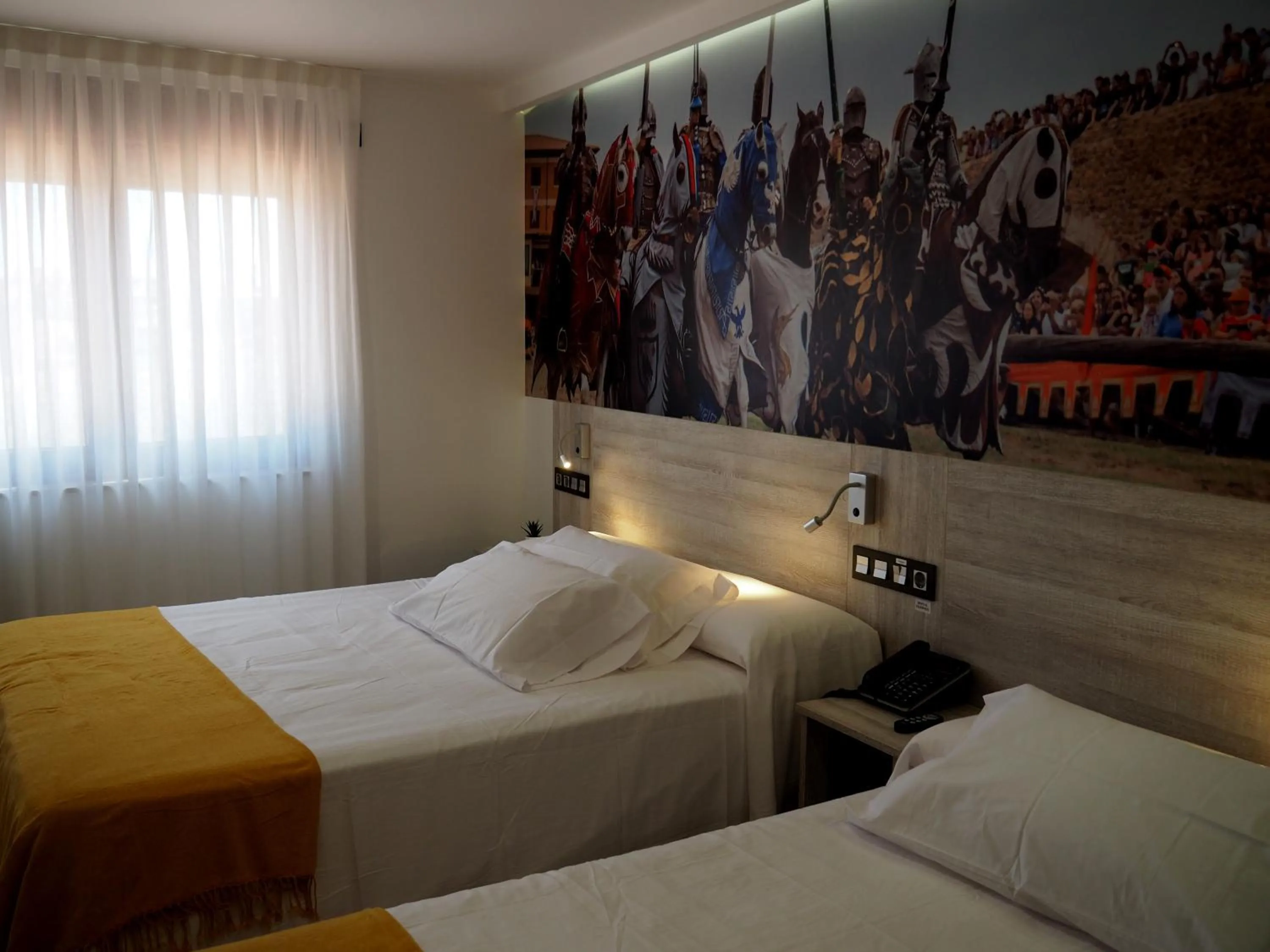 Bed in Hostal Don Suero de Quiñones