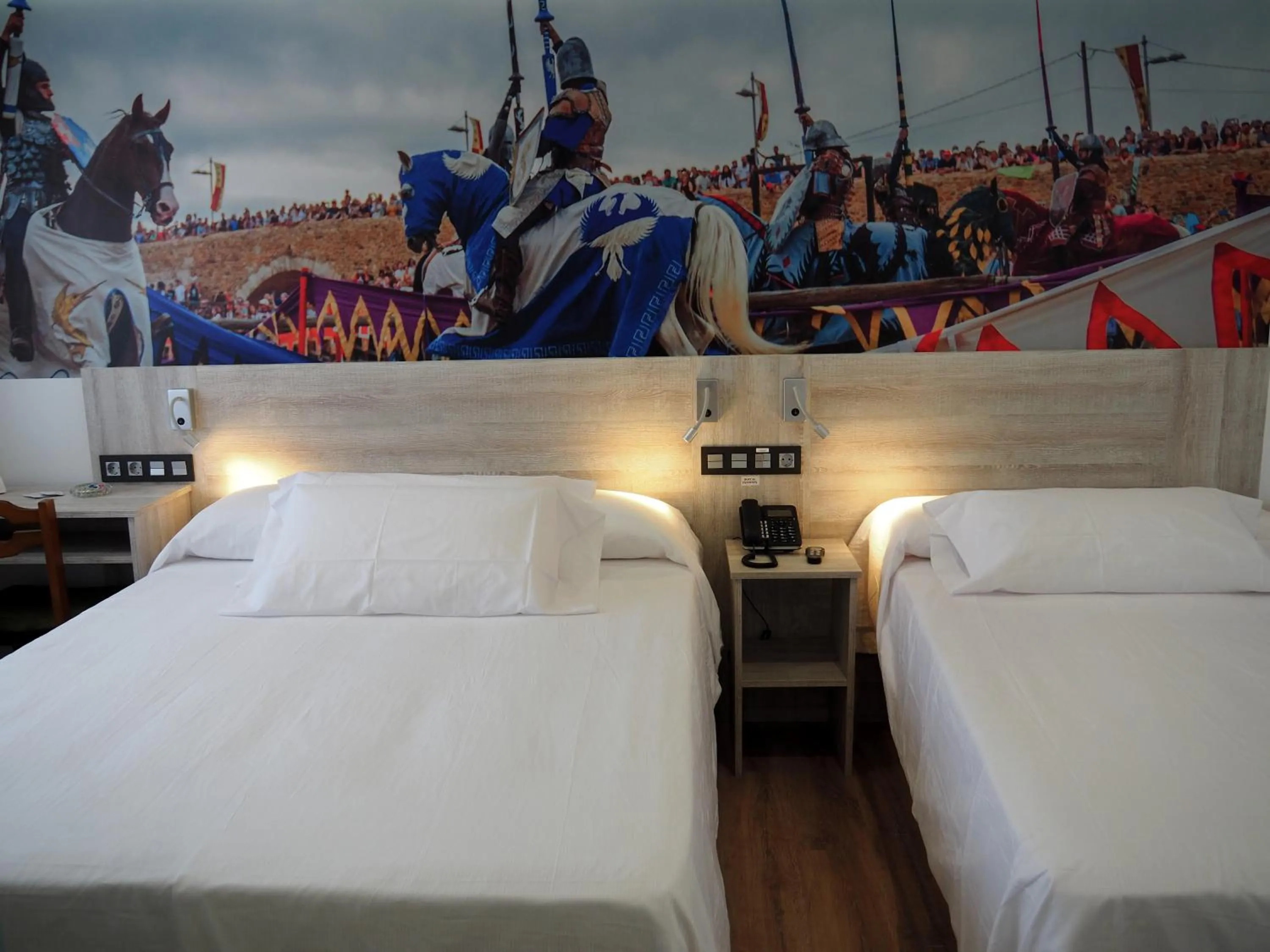 Bed in Hostal Don Suero de Quiñones