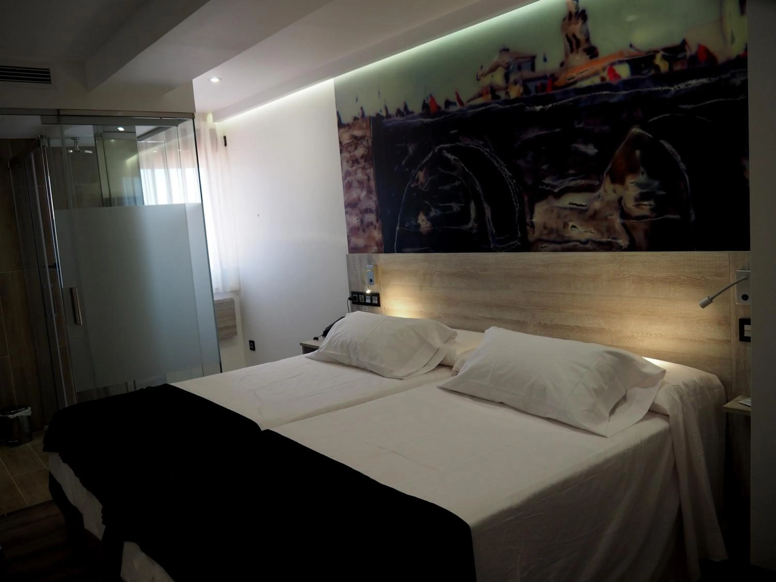 Bed in Hostal Don Suero de Quiñones