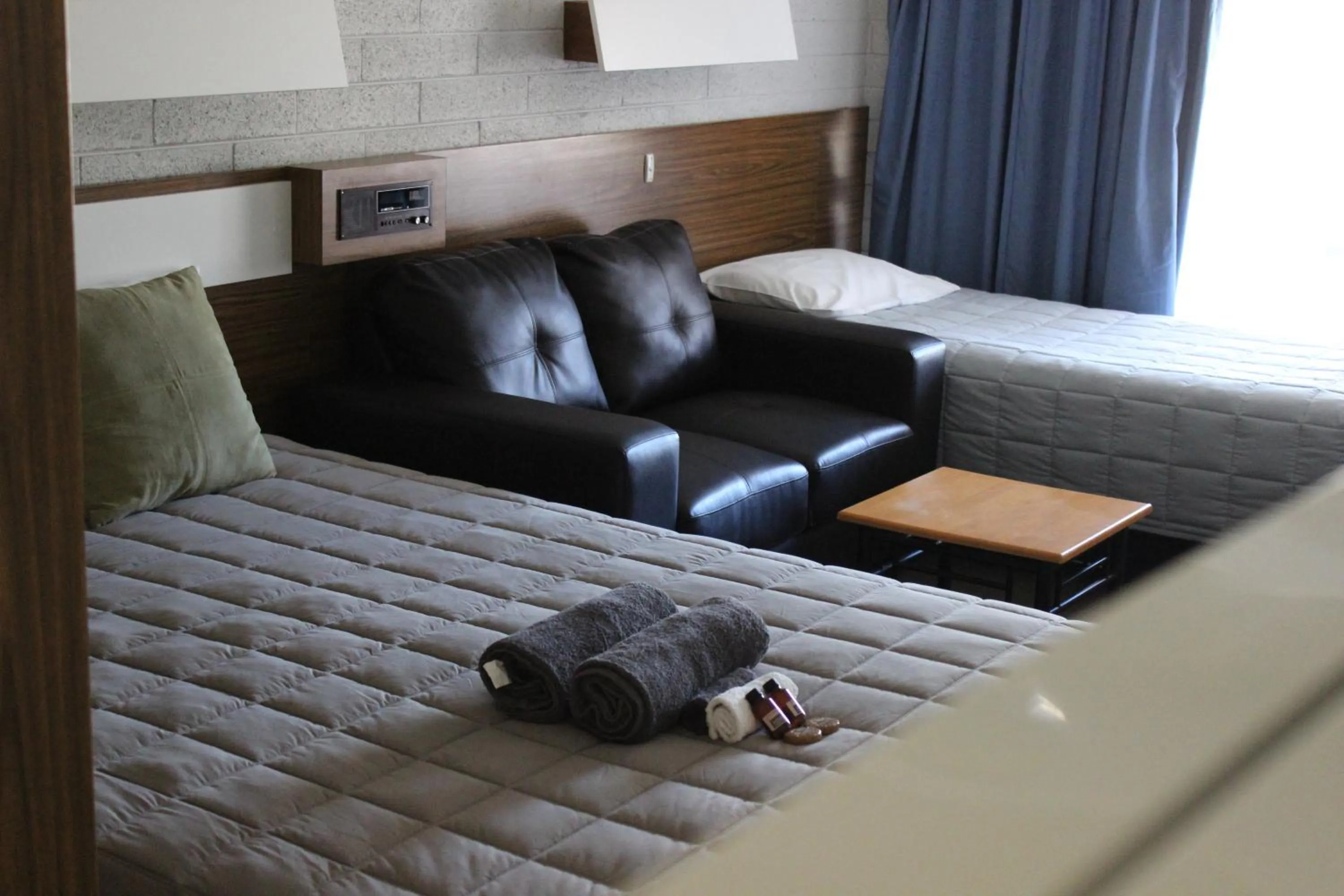 Bed in Thomas Lodge Motel