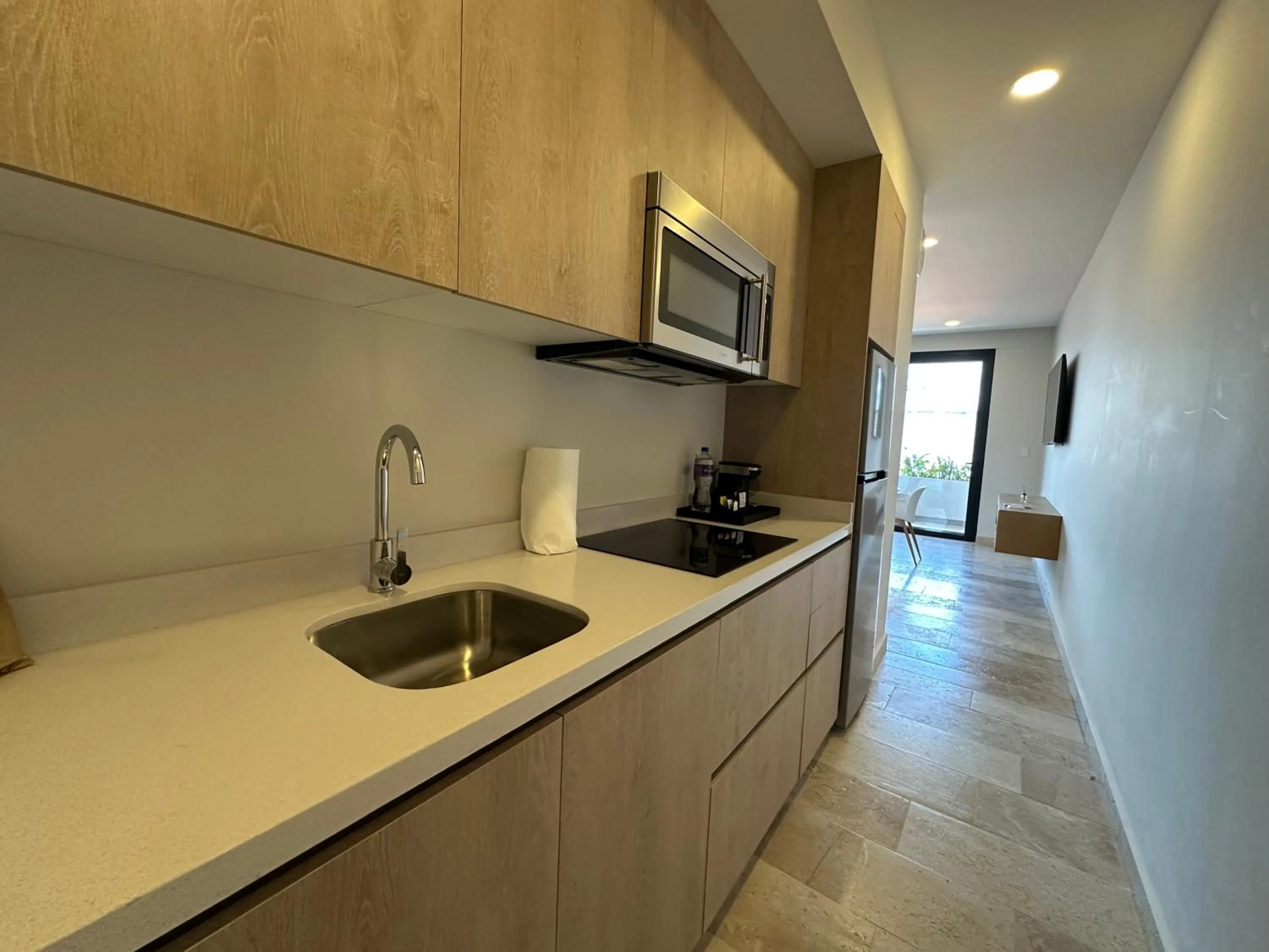 Kitchen or kitchenette in abba Suites Playa del Carmen