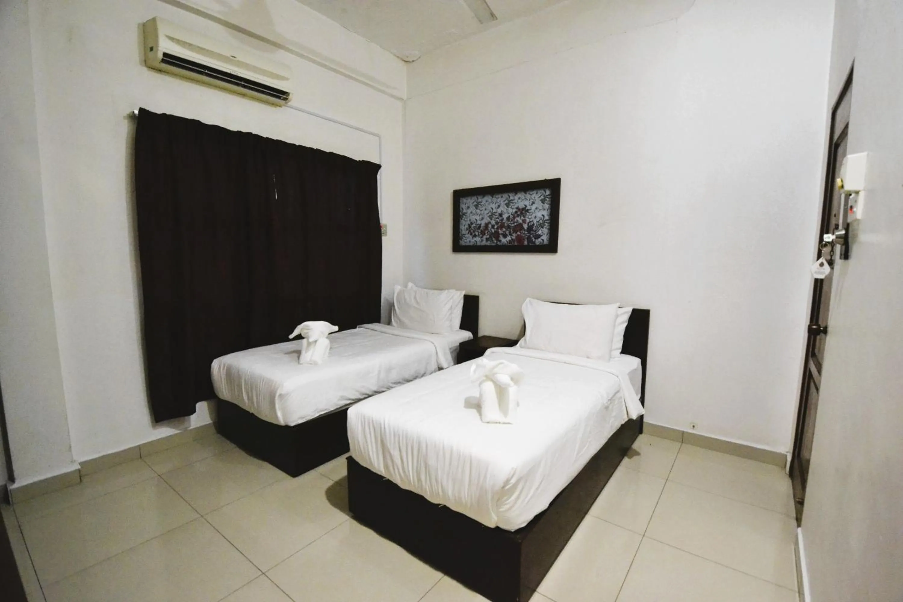 Bed in AZYA Hotel