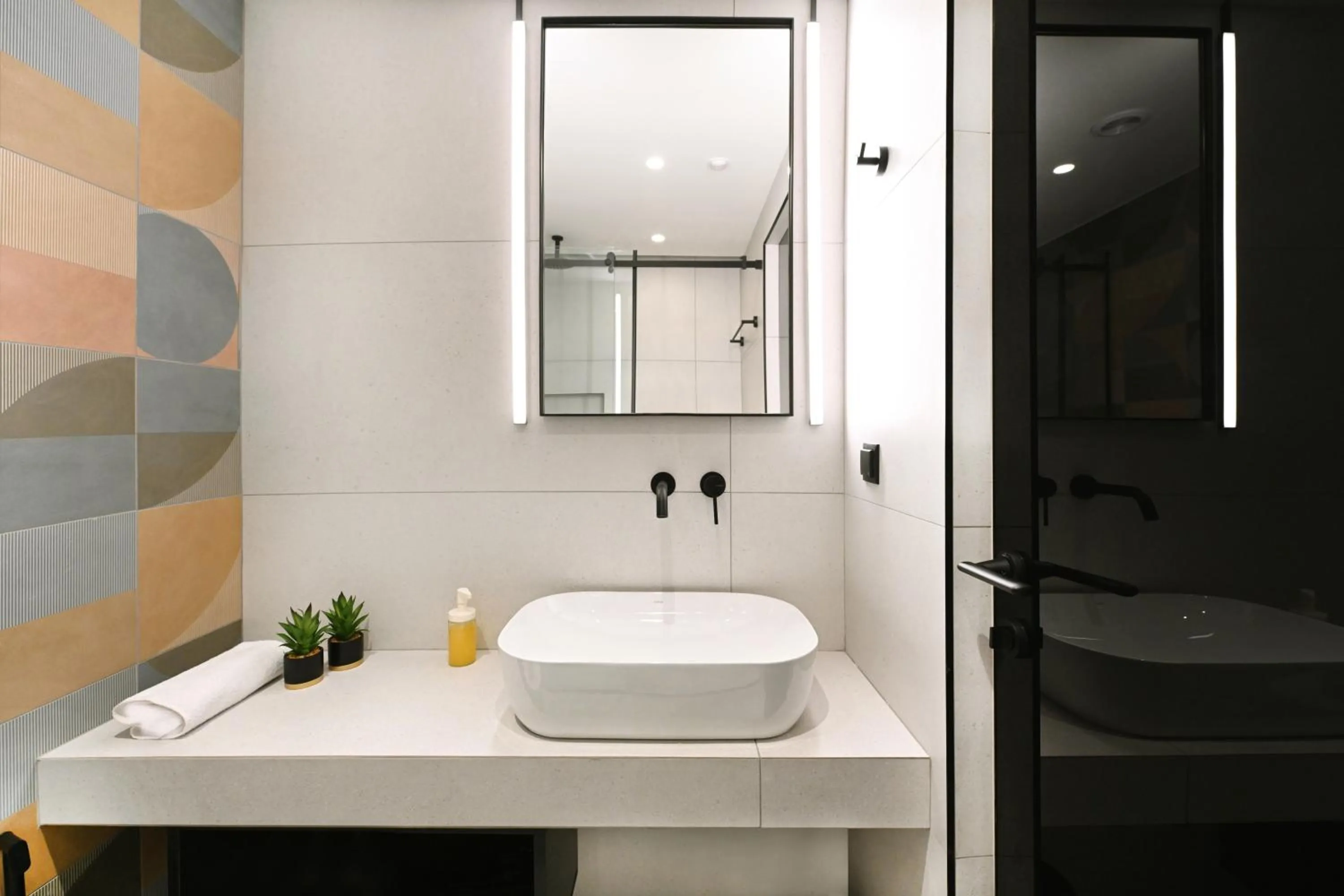 Bathroom in Icon Central SKG