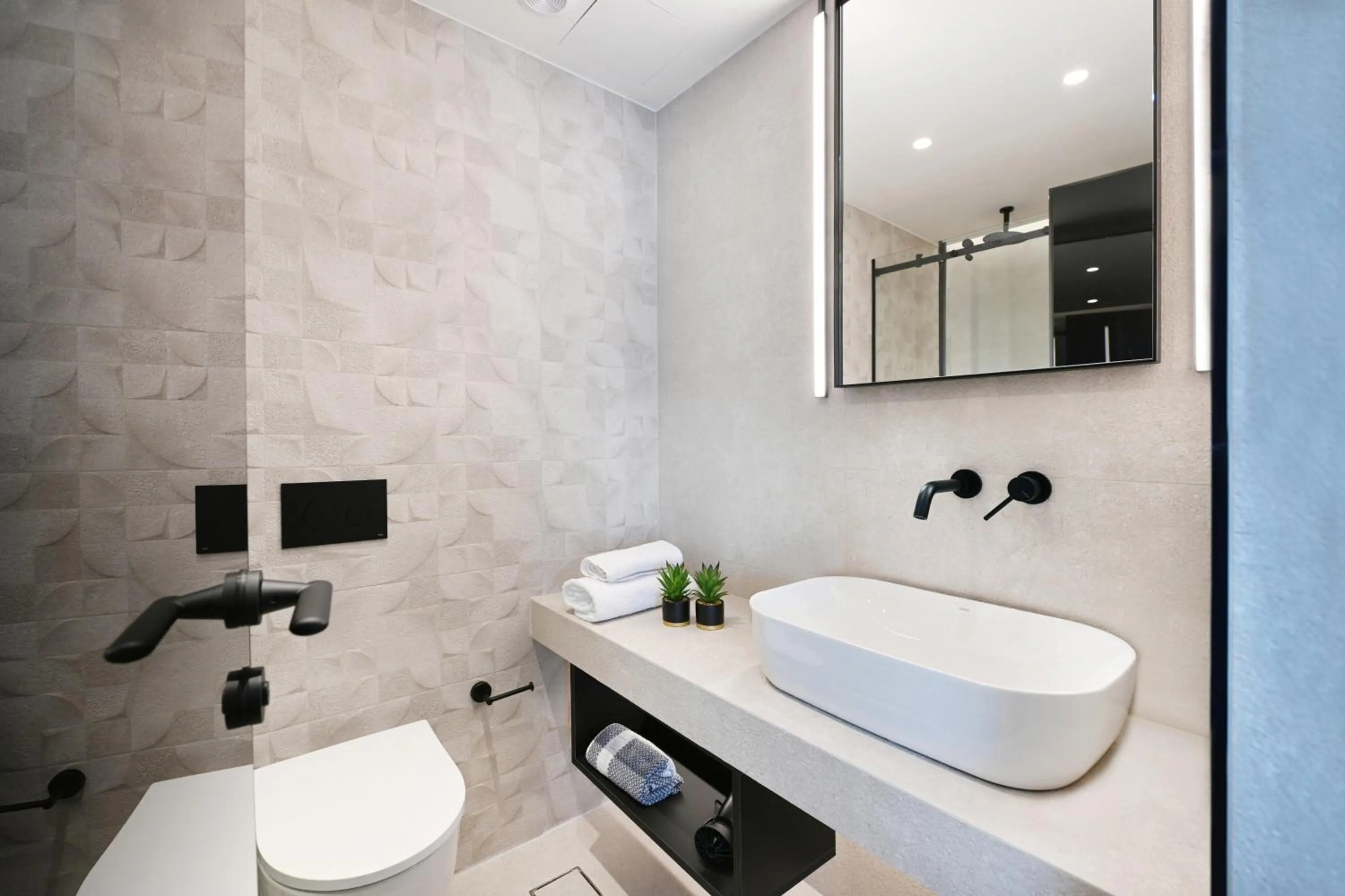 Bathroom in Icon Central SKG