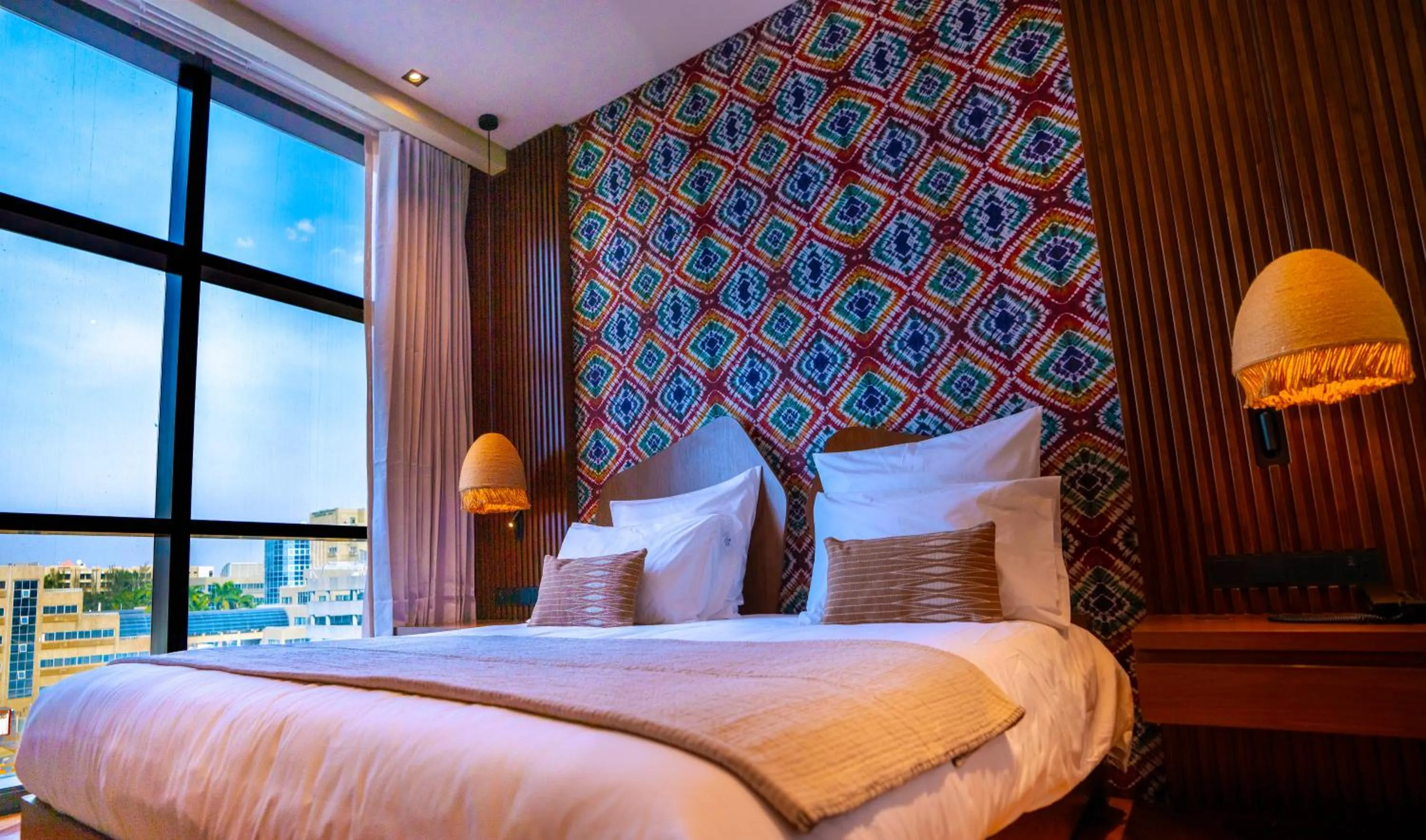 Bed in Onomo Allure Abuja AATC Hotel