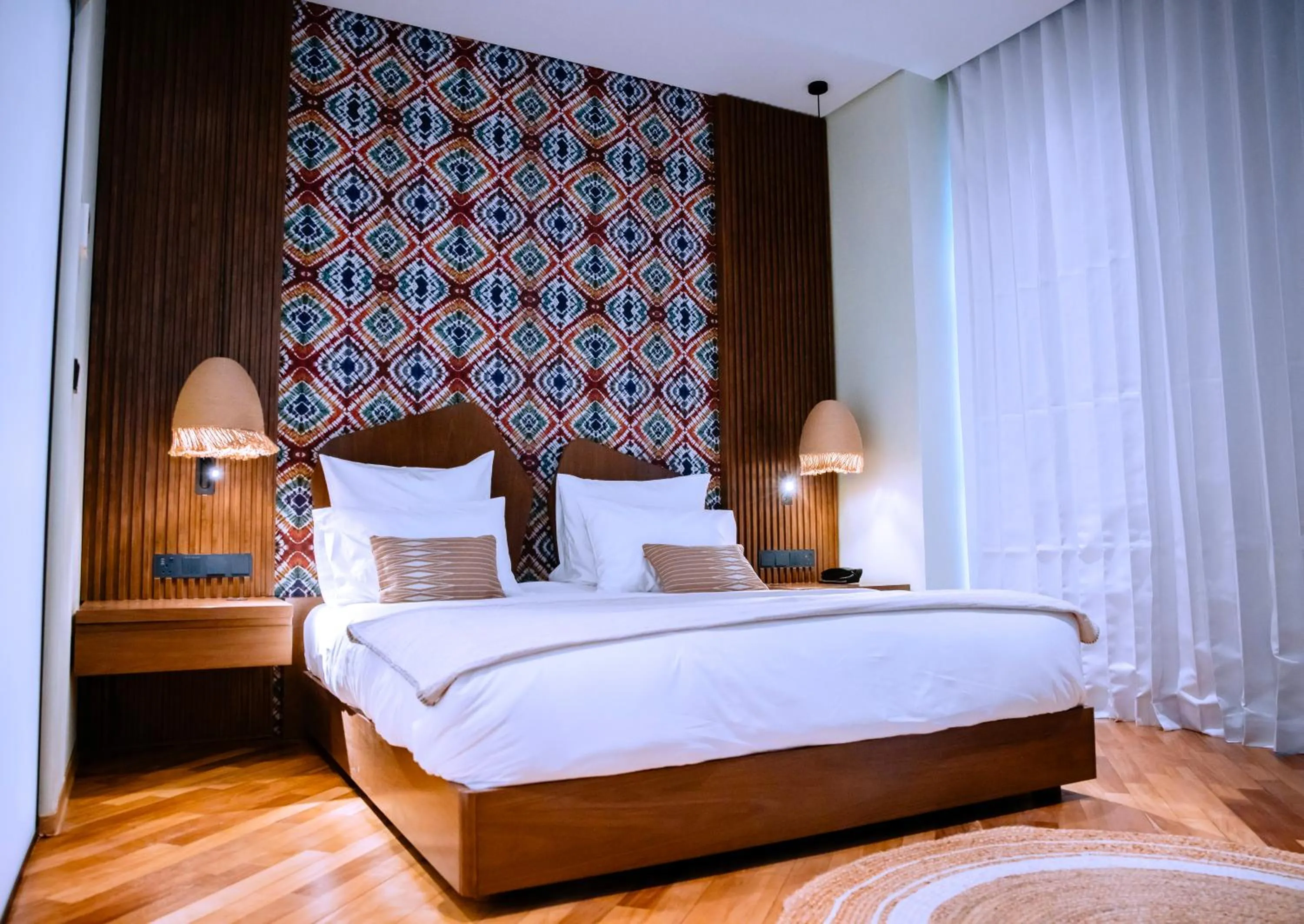 Bed in Onomo Allure Abuja AATC Hotel