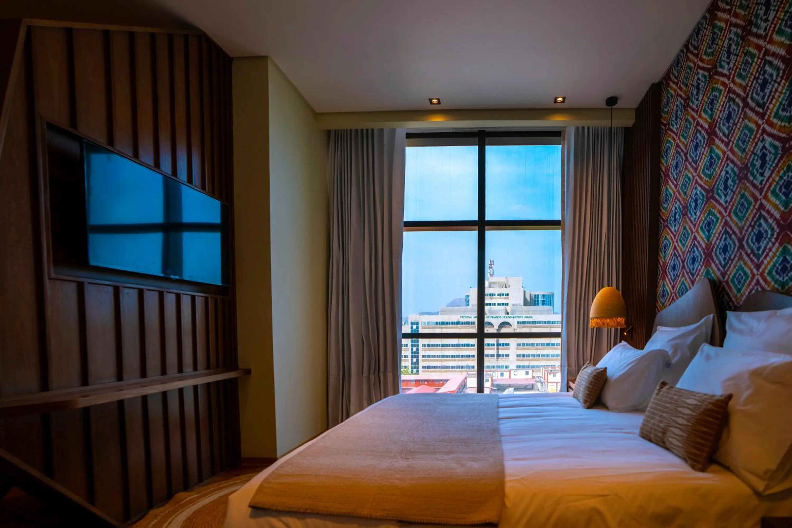 Bed in Onomo Allure Abuja AATC Hotel