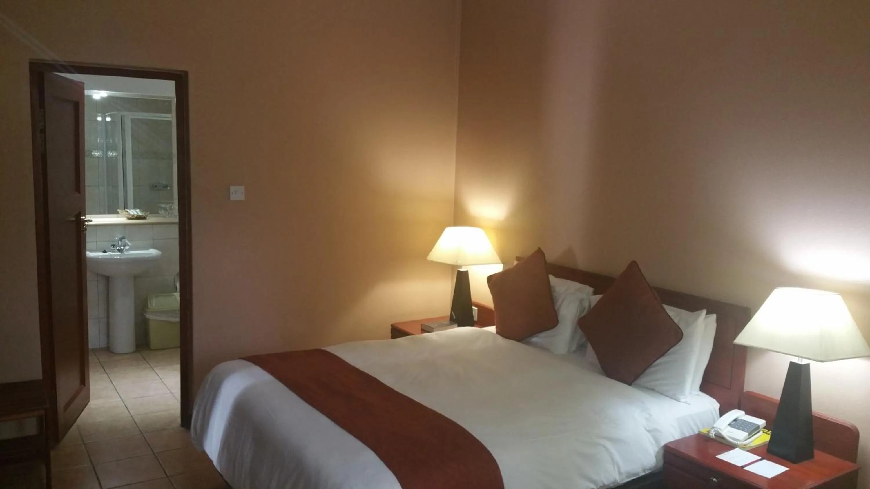 Bed in M'kango Golfview Hotel