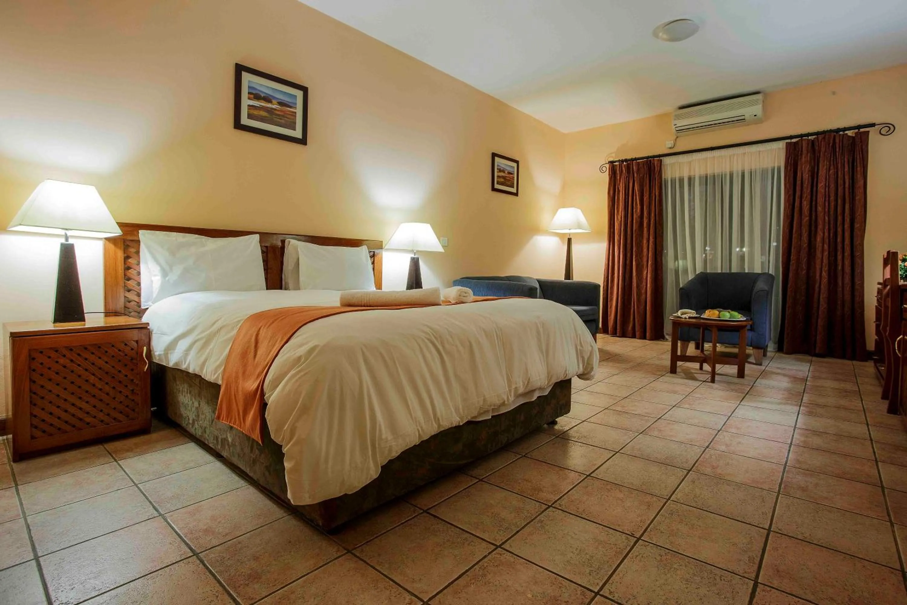 Bed in M'kango Golfview Hotel