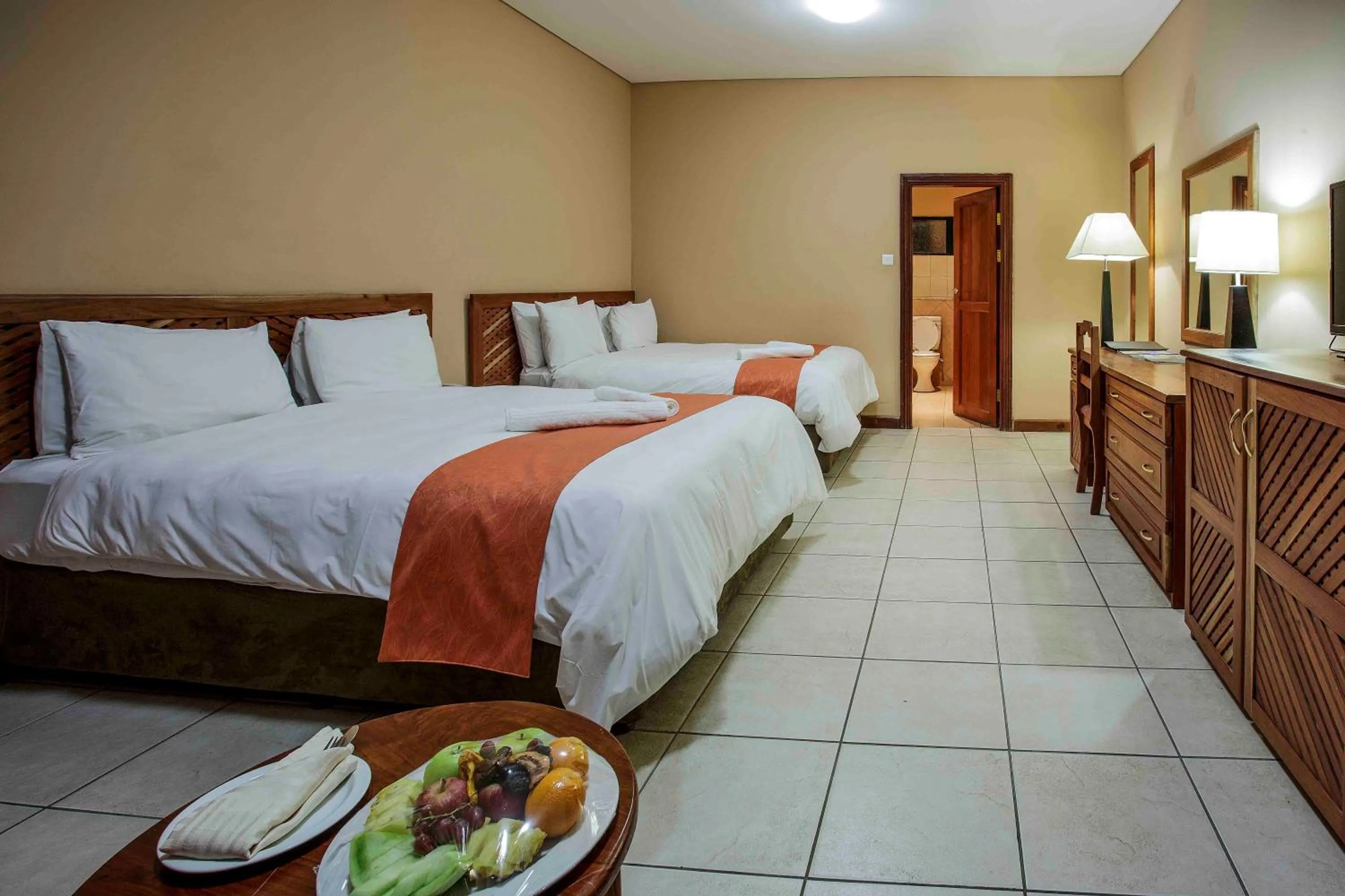 Bed in M'kango Golfview Hotel