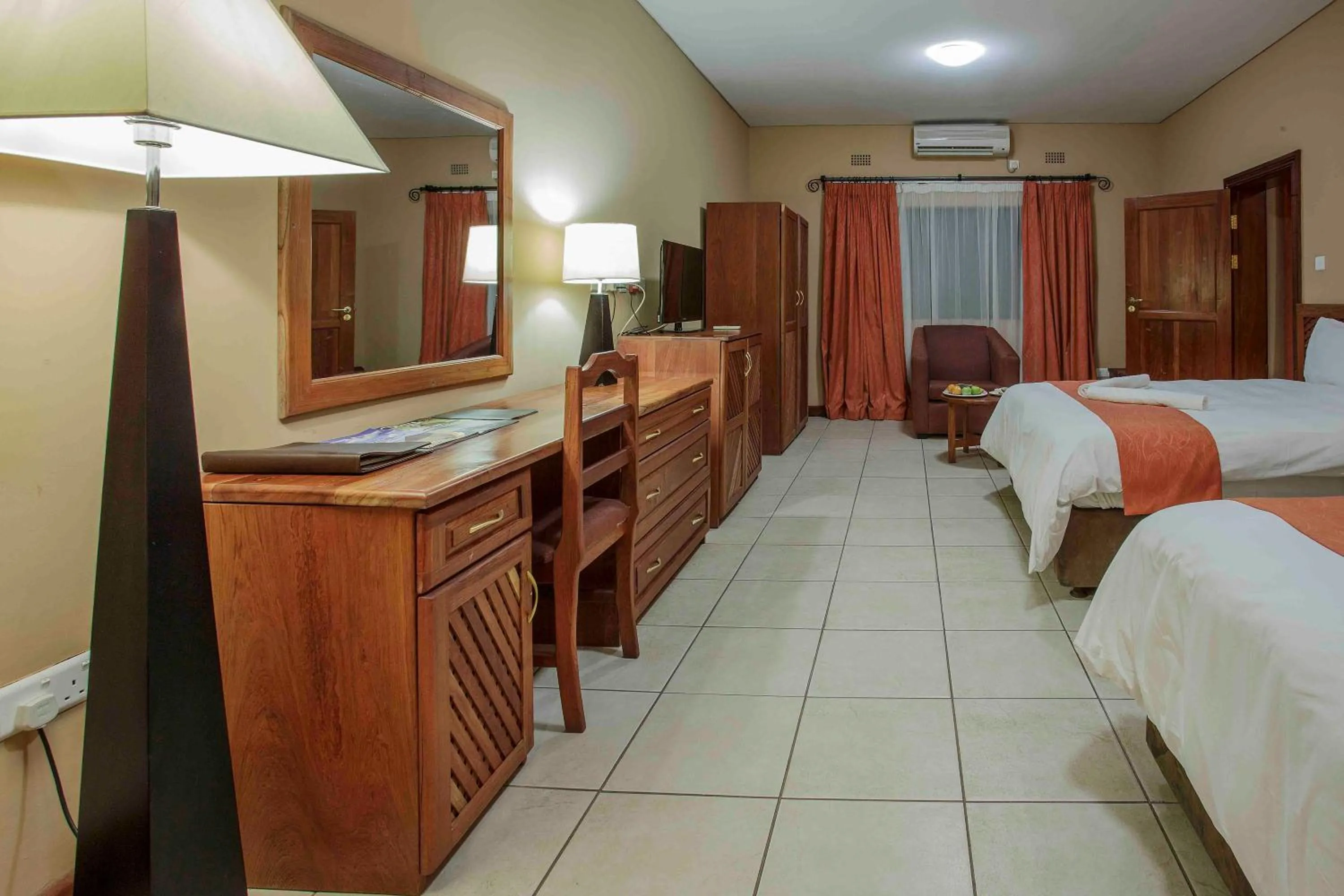 Bed in M'kango Golfview Hotel