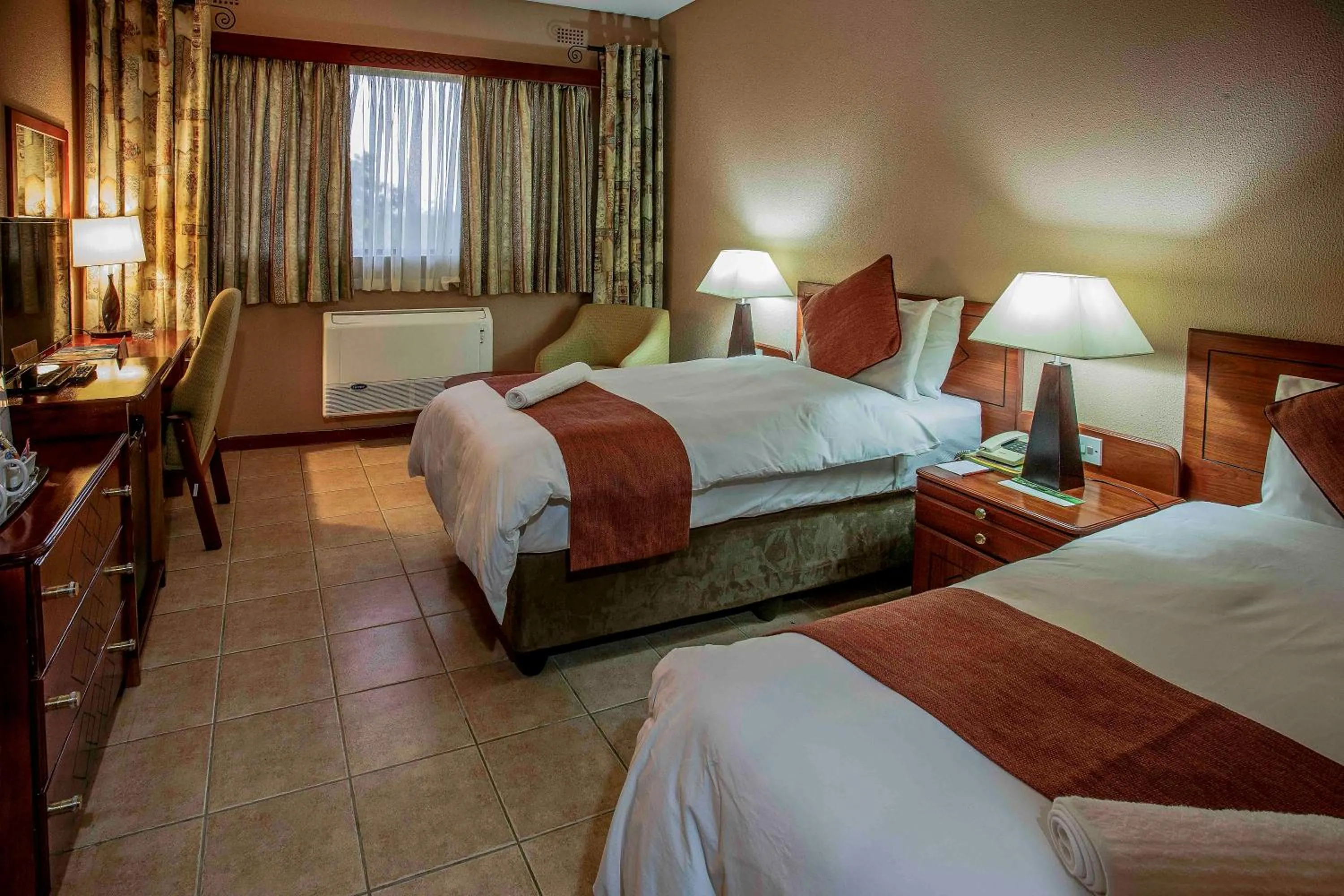 Bed in M'kango Golfview Hotel