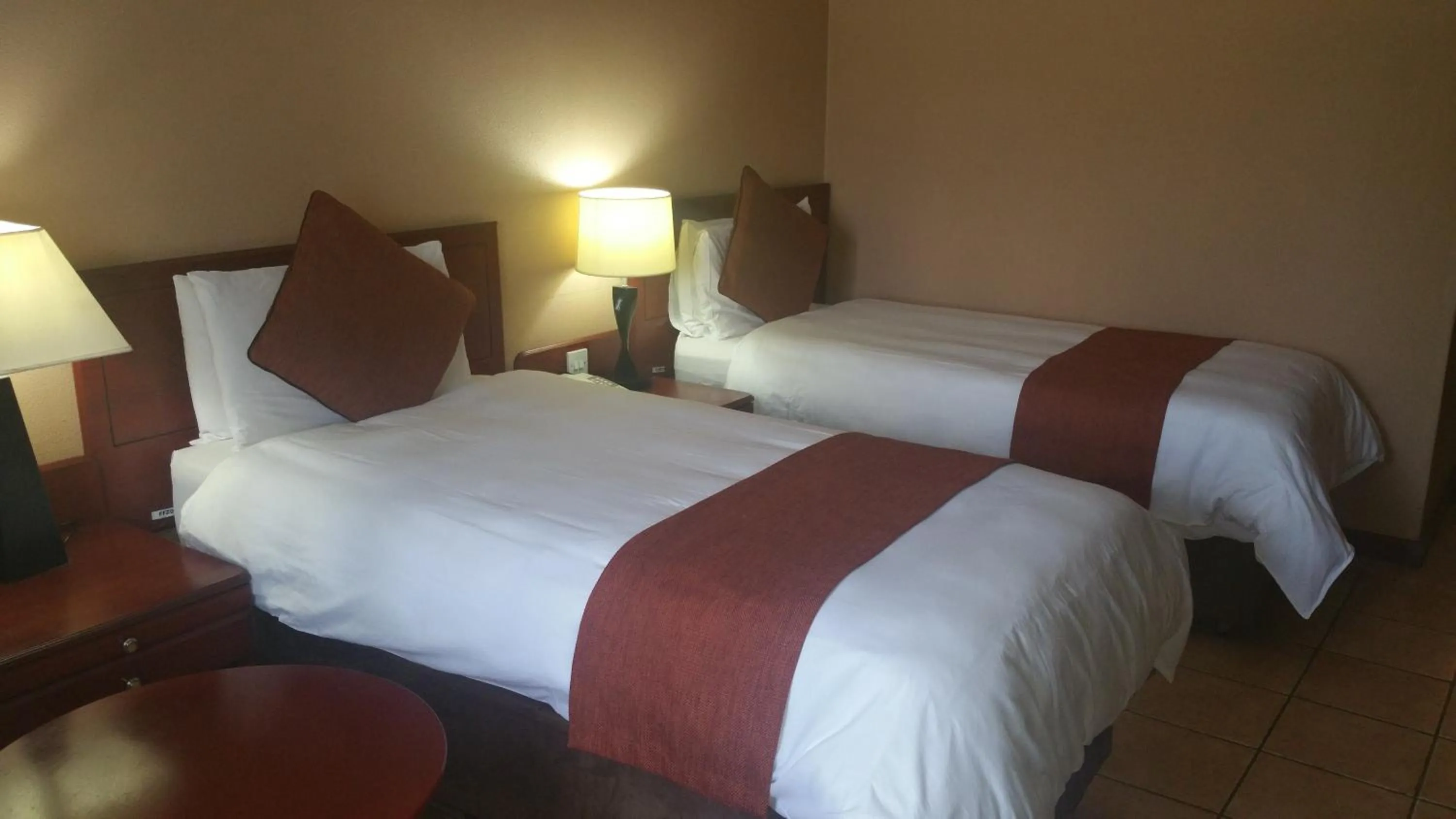 Bed in M'kango Golfview Hotel