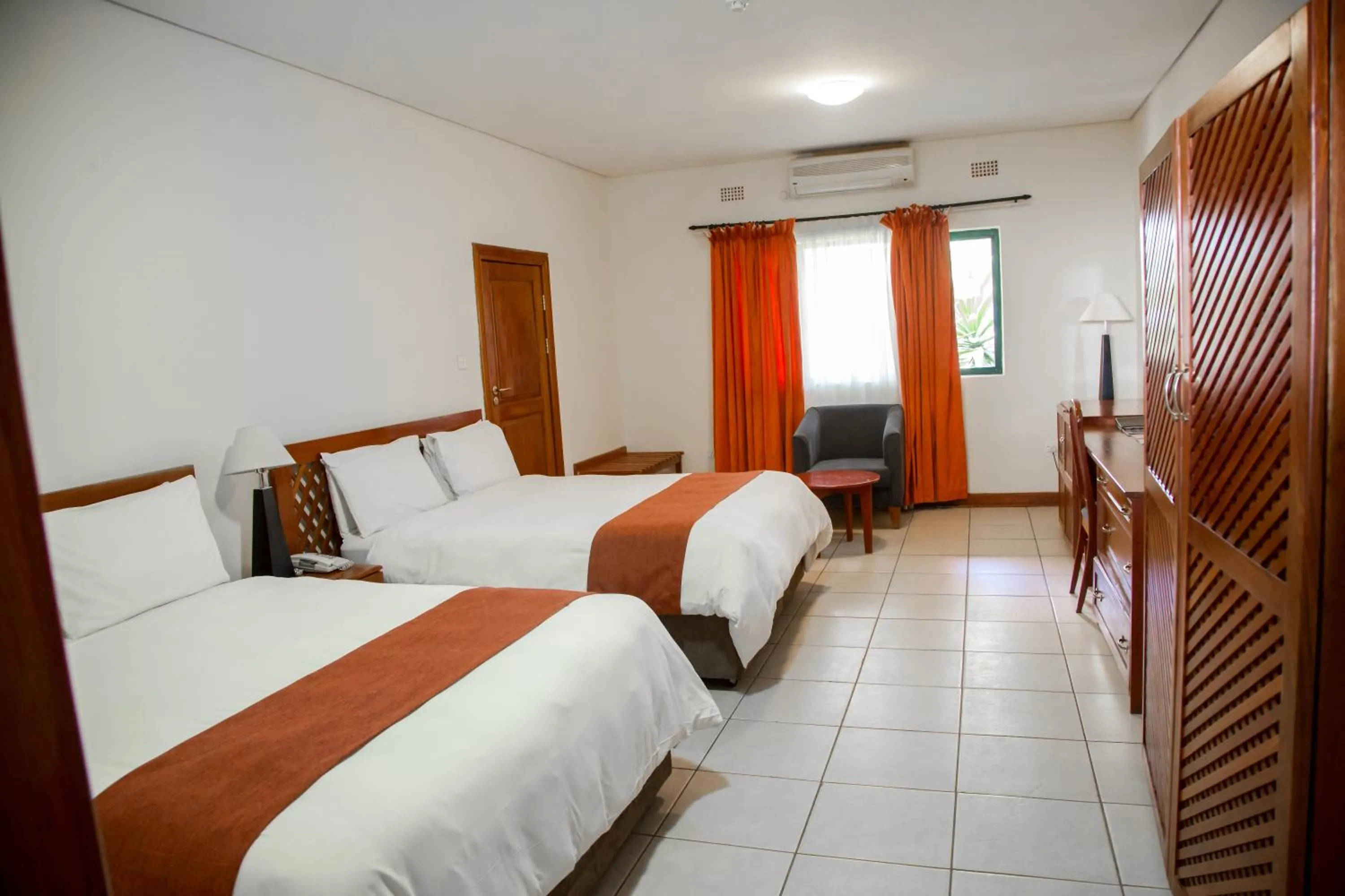 Bed in M'kango Golfview Hotel