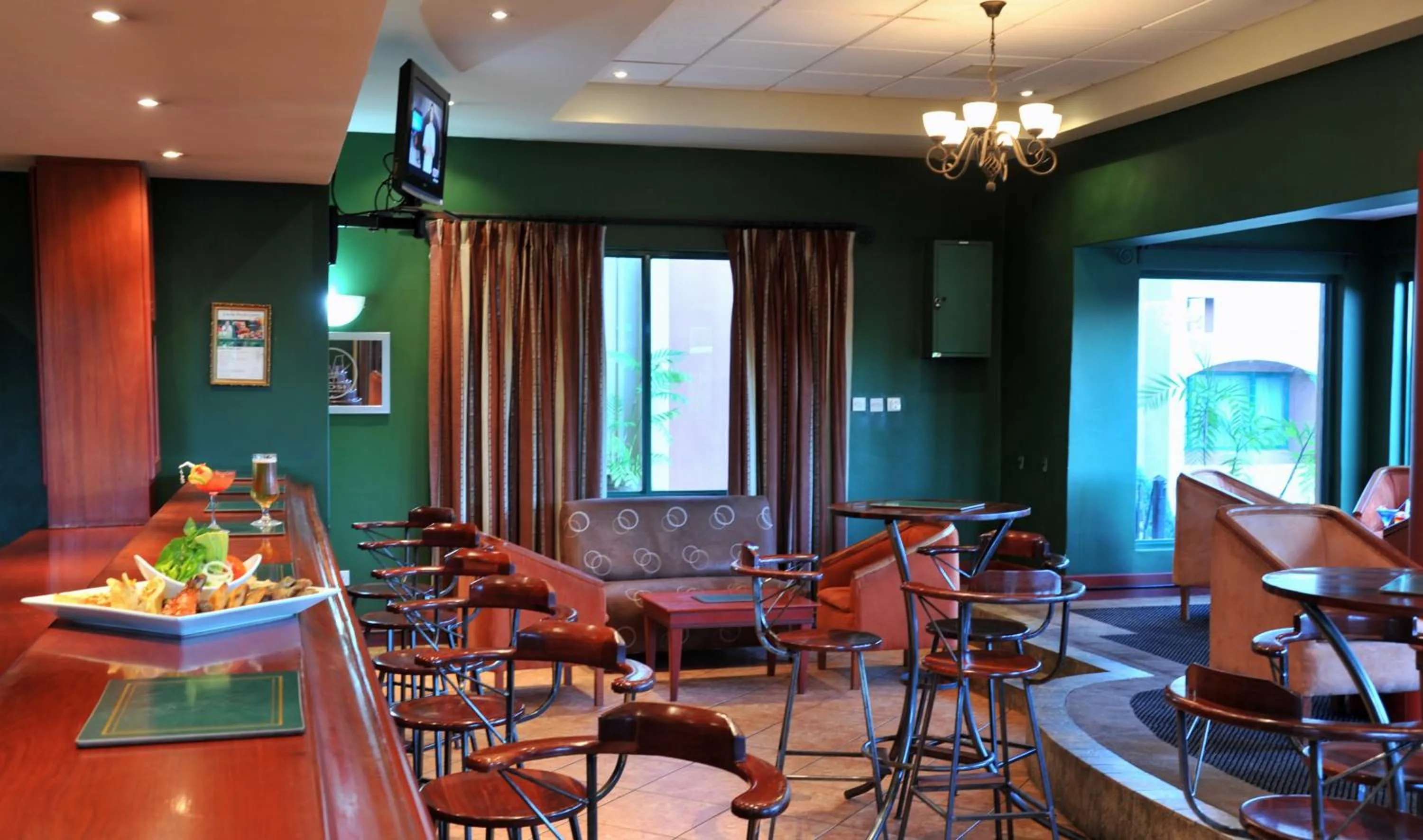 Lounge or bar in M'kango Golfview Hotel