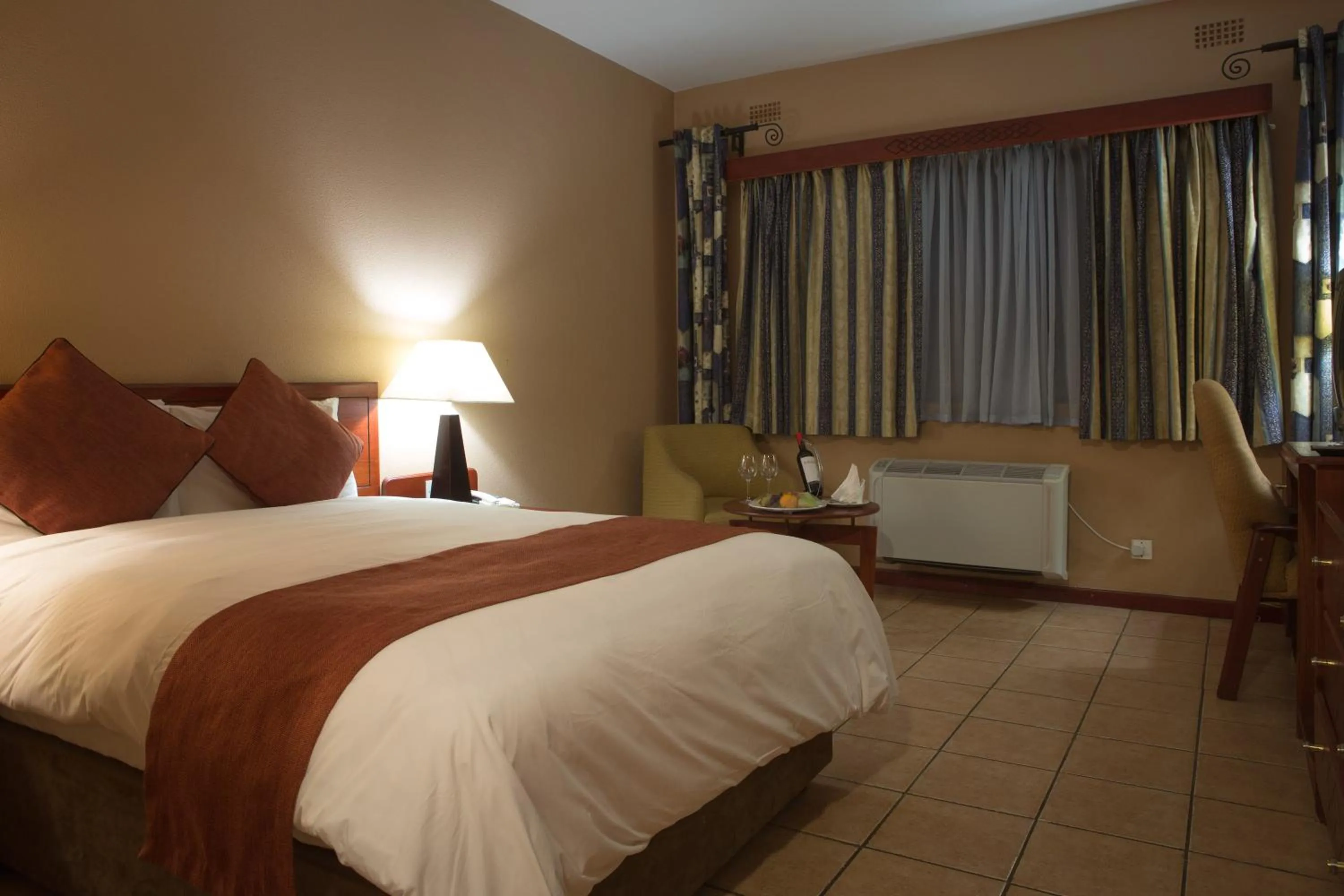 Photo of the whole room, Bed in M'kango Golfview Hotel