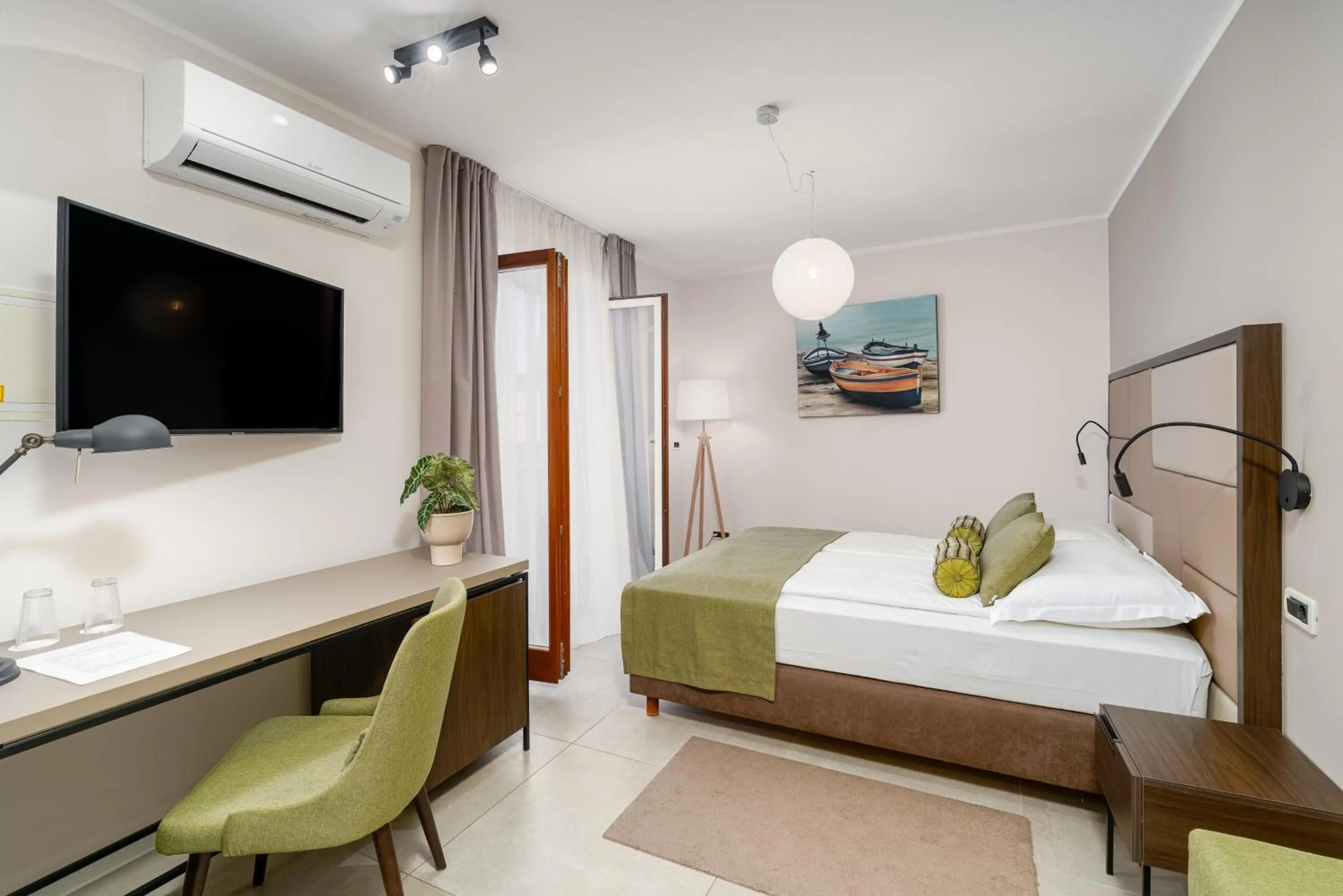 Photo of the whole room, Bed in Al Porto Suites - NEW!