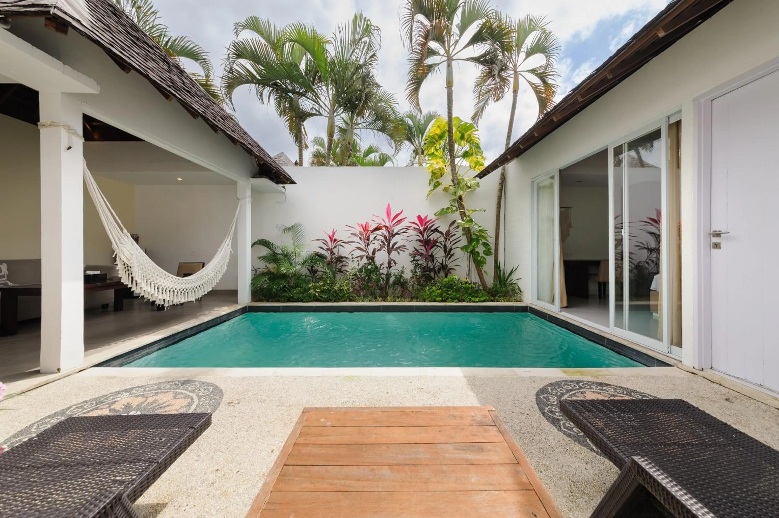 Swimming pool in Tan's Astana Villa's by The Lavana
