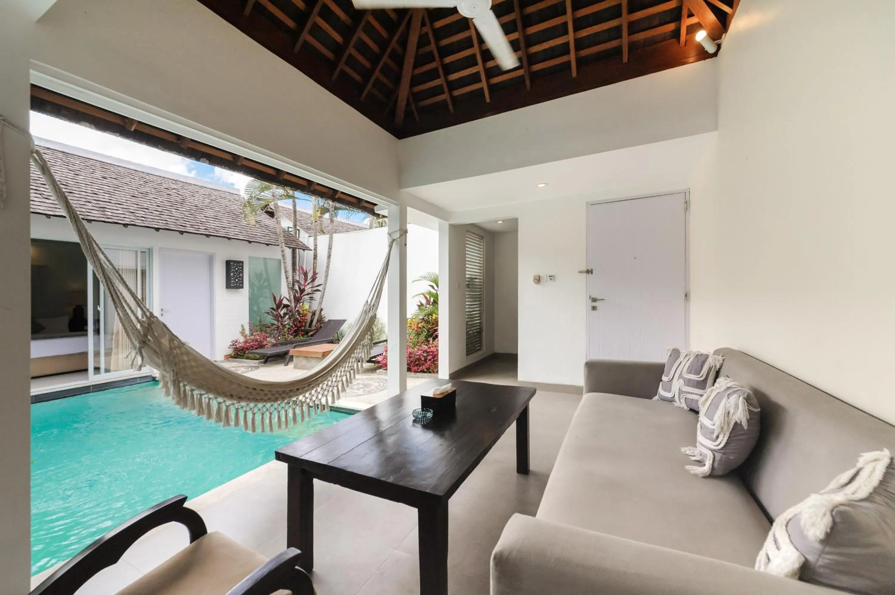 Seating area in Tan's Astana Villa's by The Lavana