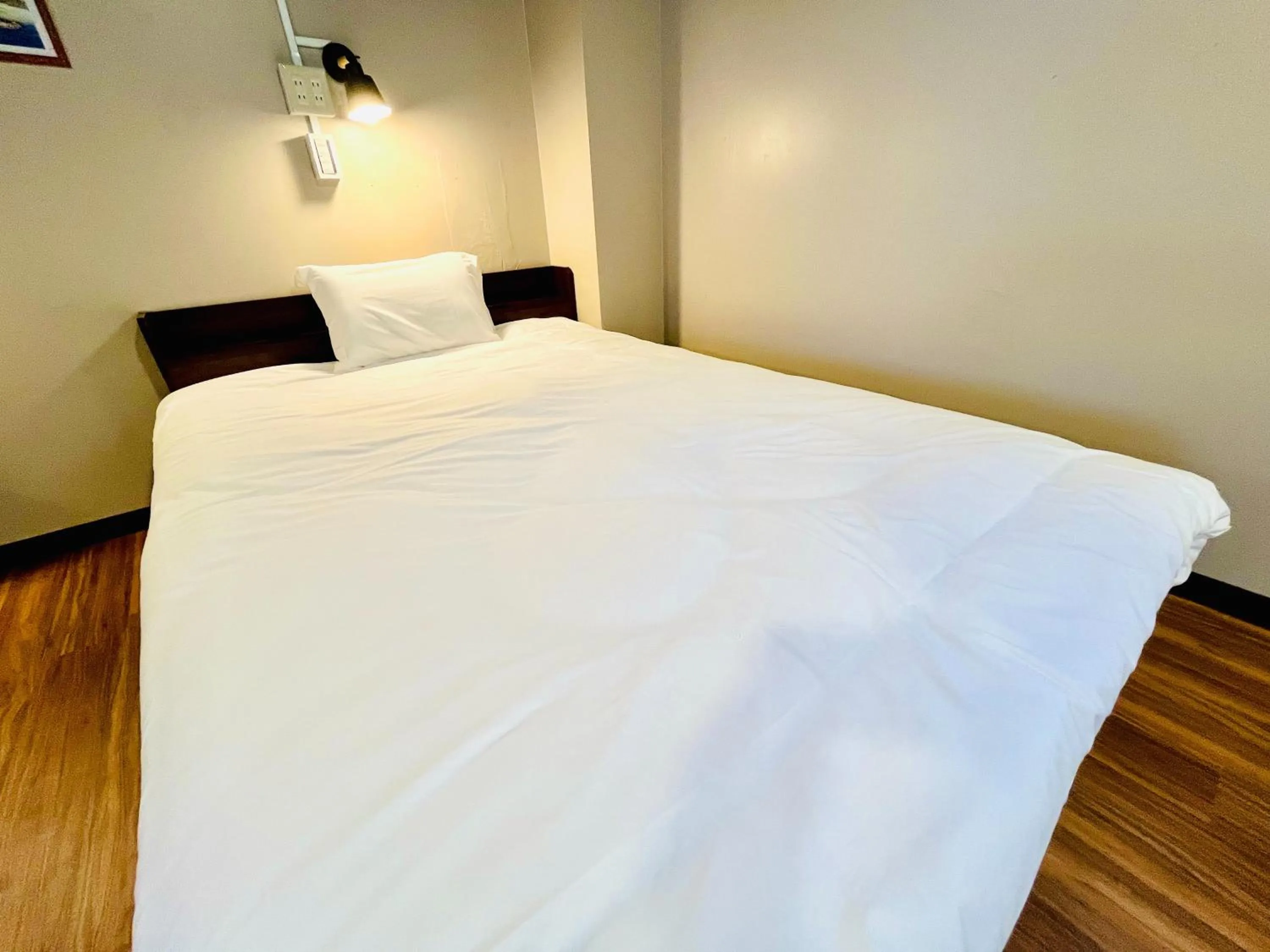 Bed in Hinode Kagurazakaekimae Hotel