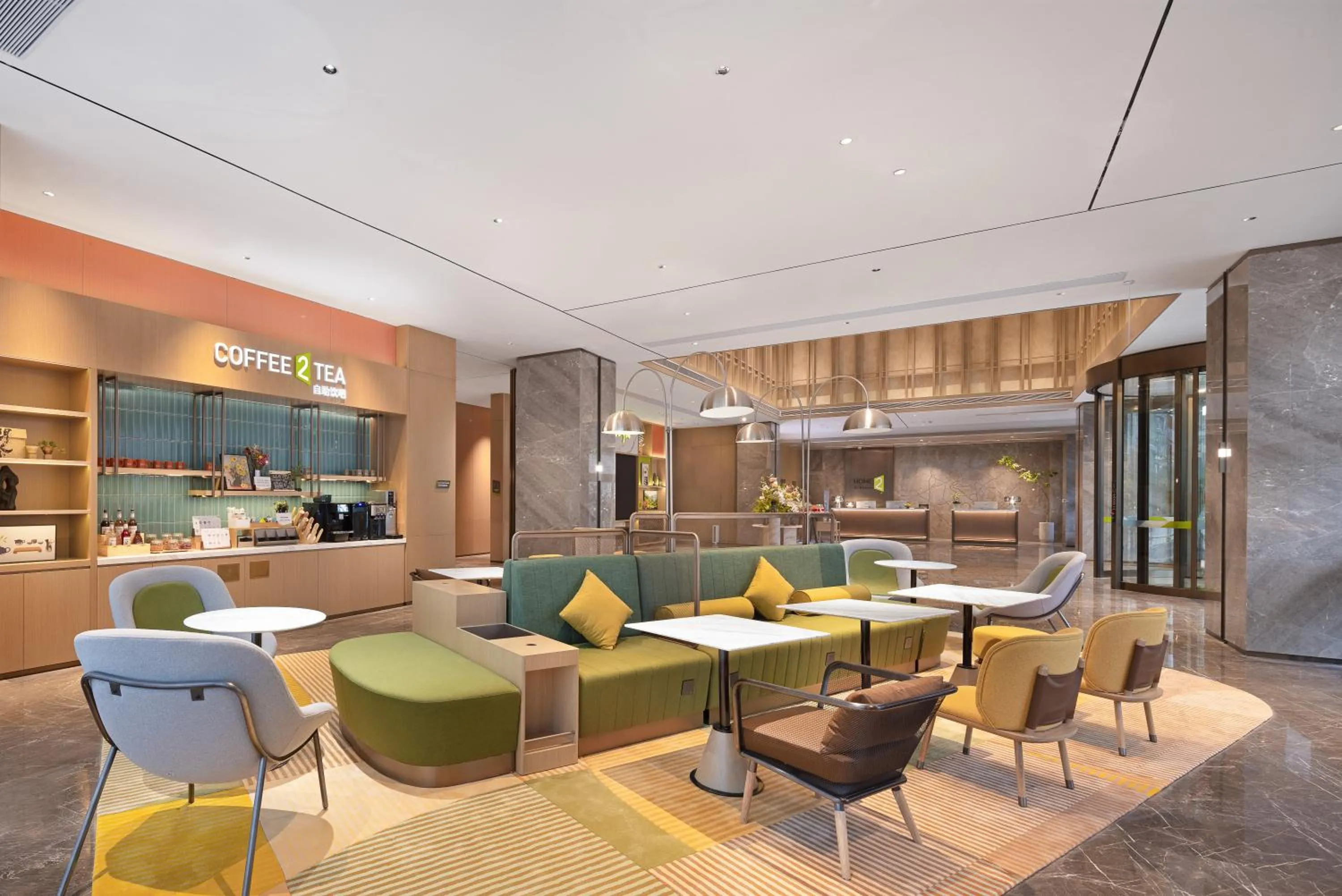 Seating area in Home2 Suite by Hilton Chaozhou