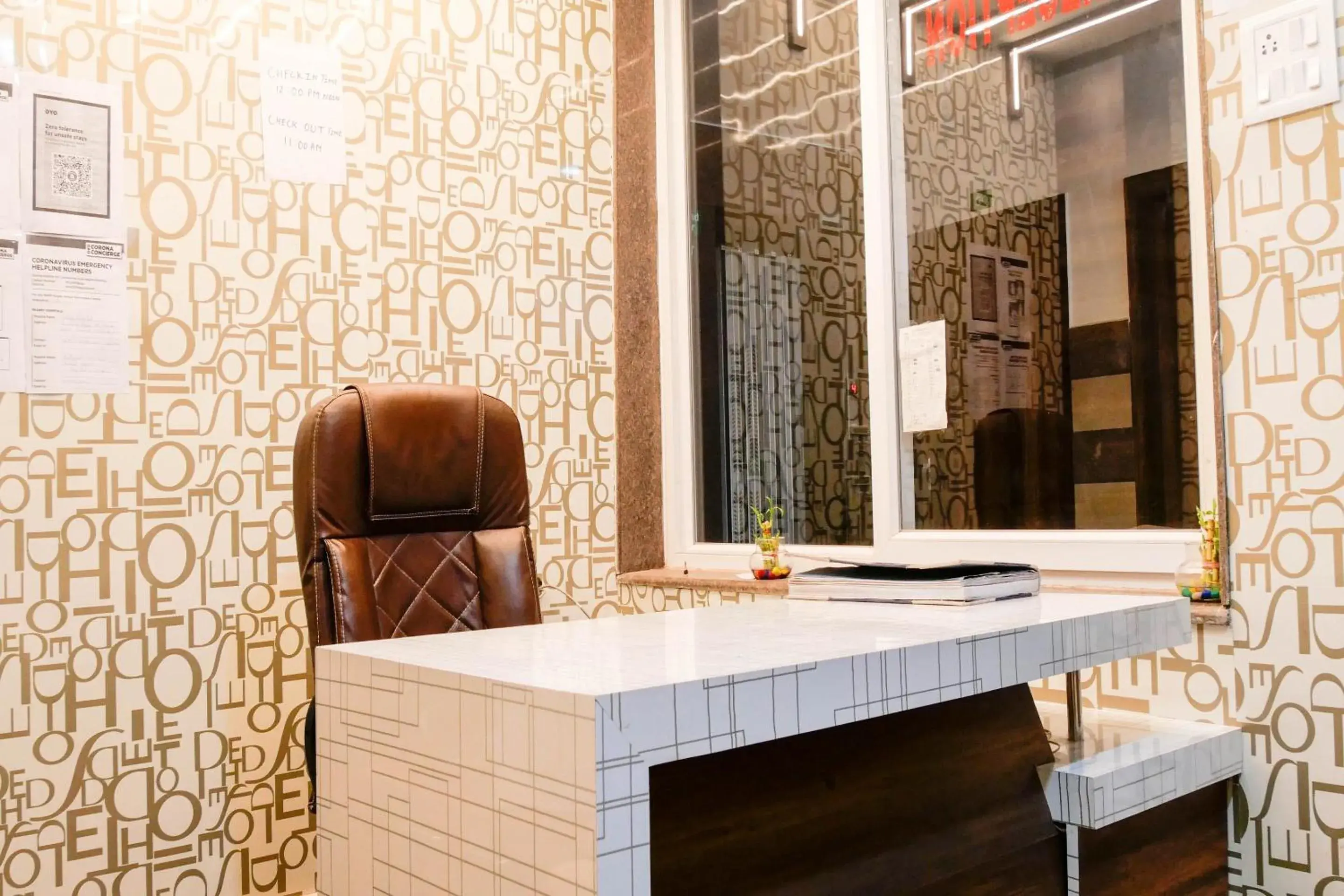 Lobby or reception in Super Collection O Hotel Day & Night Lobby or reception in Super Collection O Hotel Day & Night