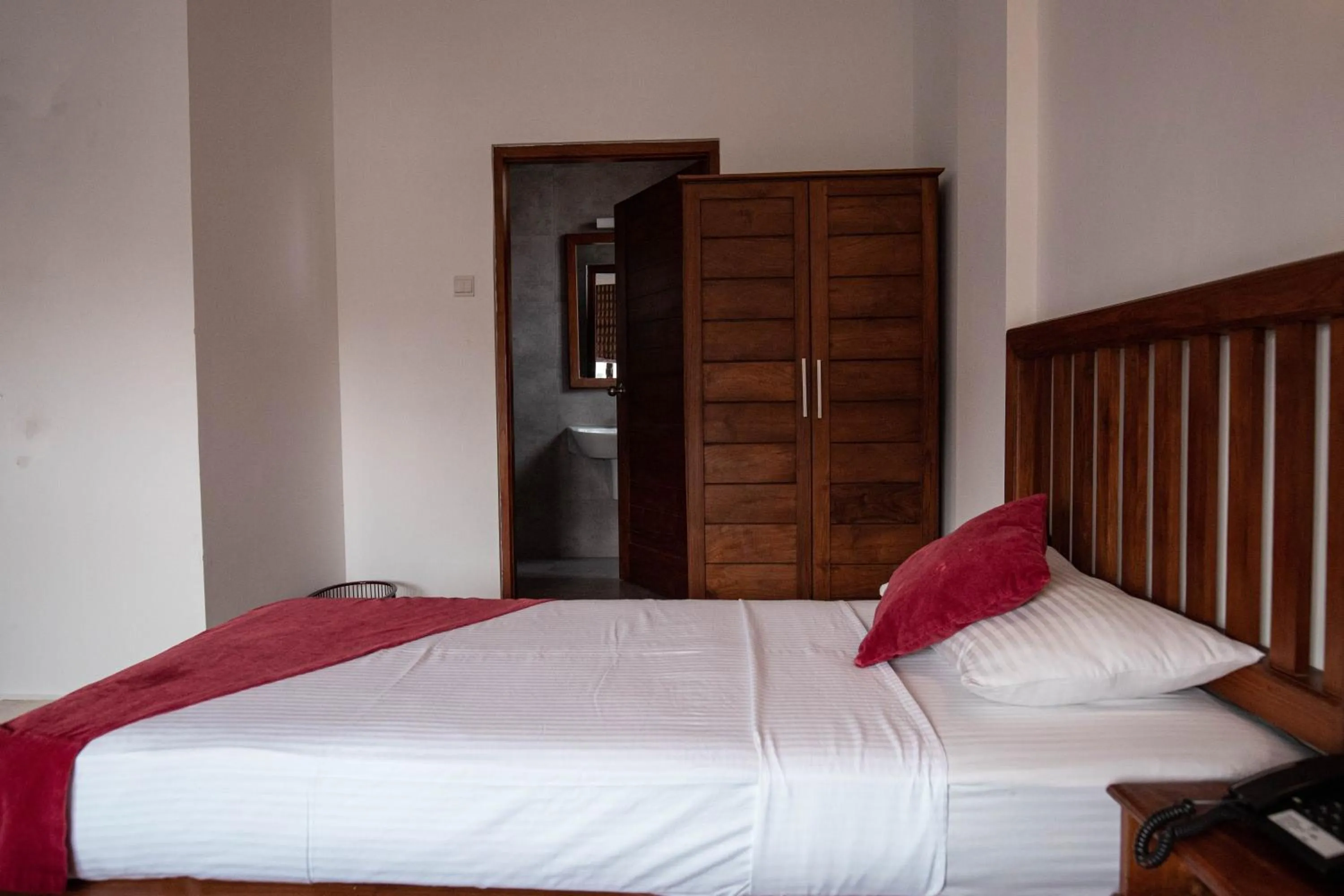 Bed in Port View City Hotel