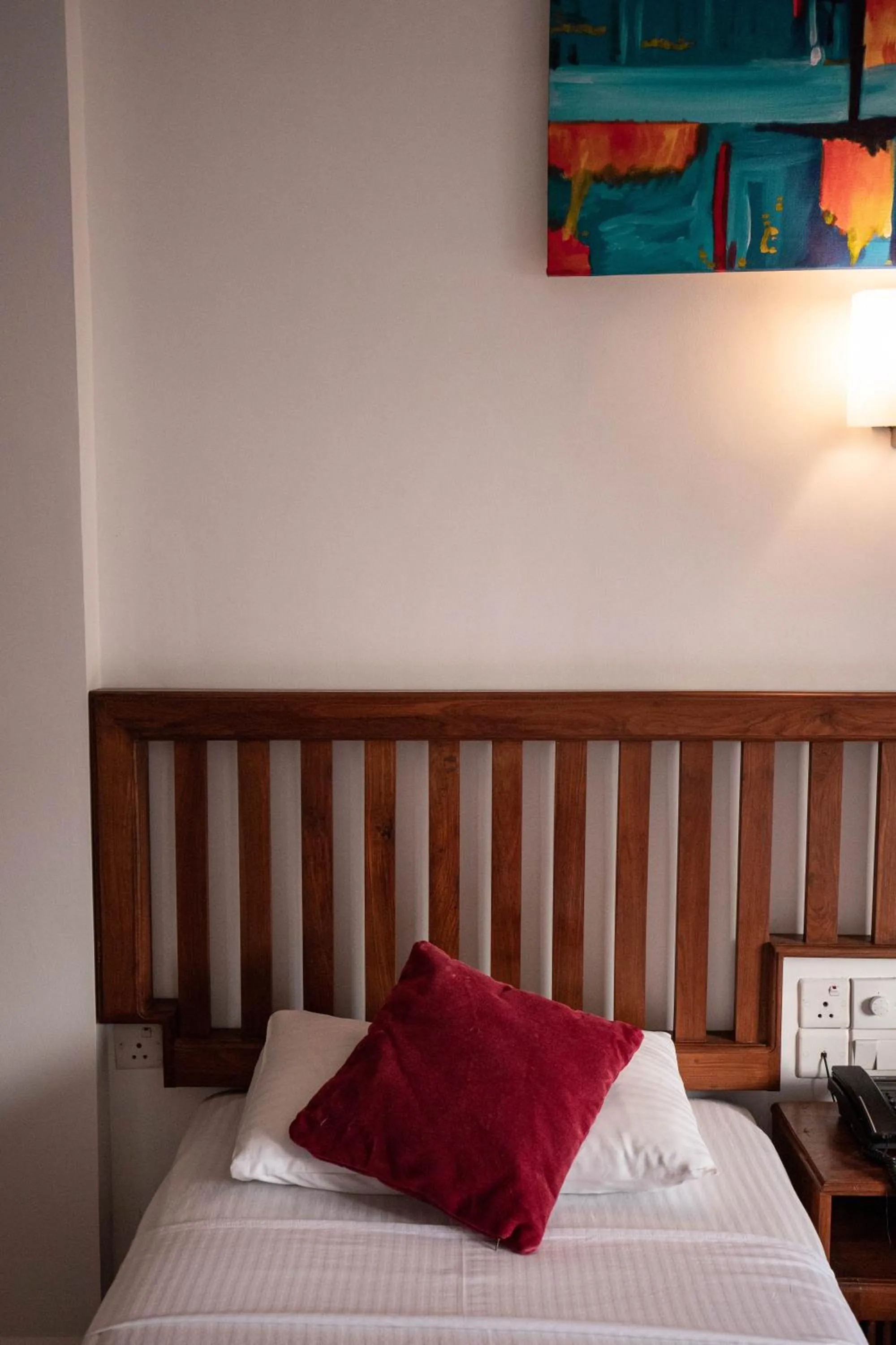 Bed in Port View City Hotel