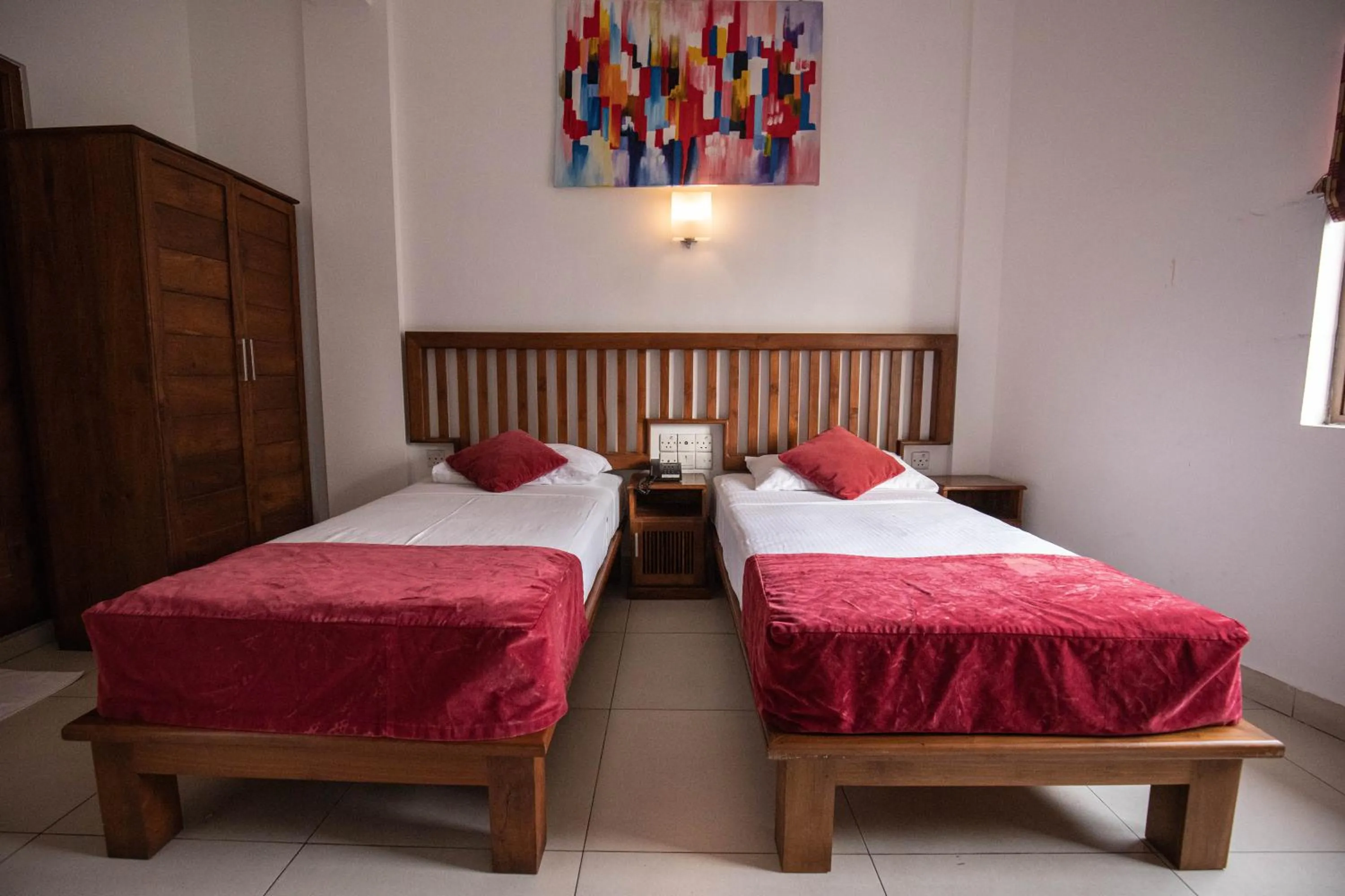 Bed in Port View City Hotel