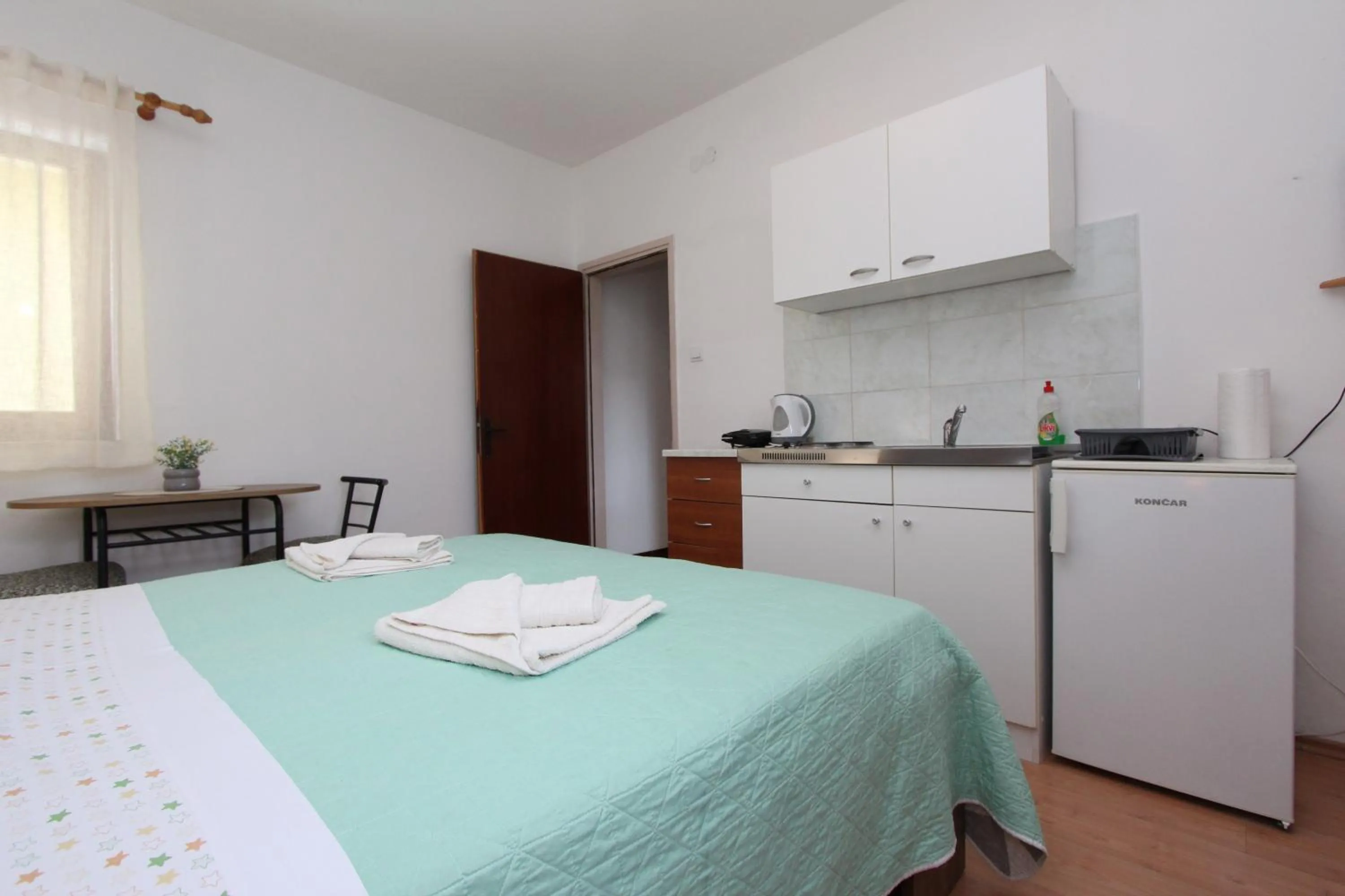 Kitchen or kitchenette, Bed in Apartments Antolovic