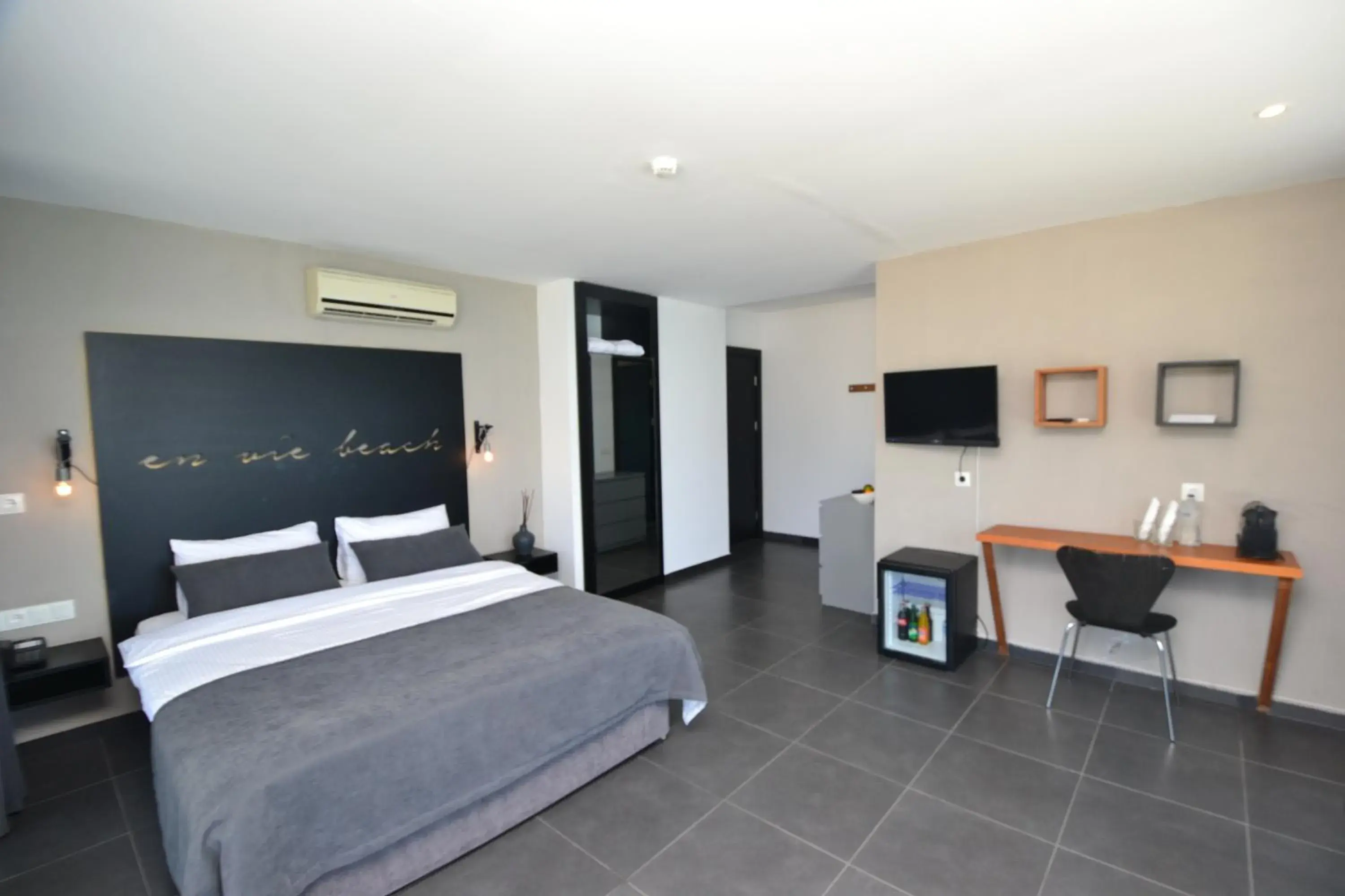 Bedroom, Bed in En Vie Beach Boutique Hotel - Adults Only