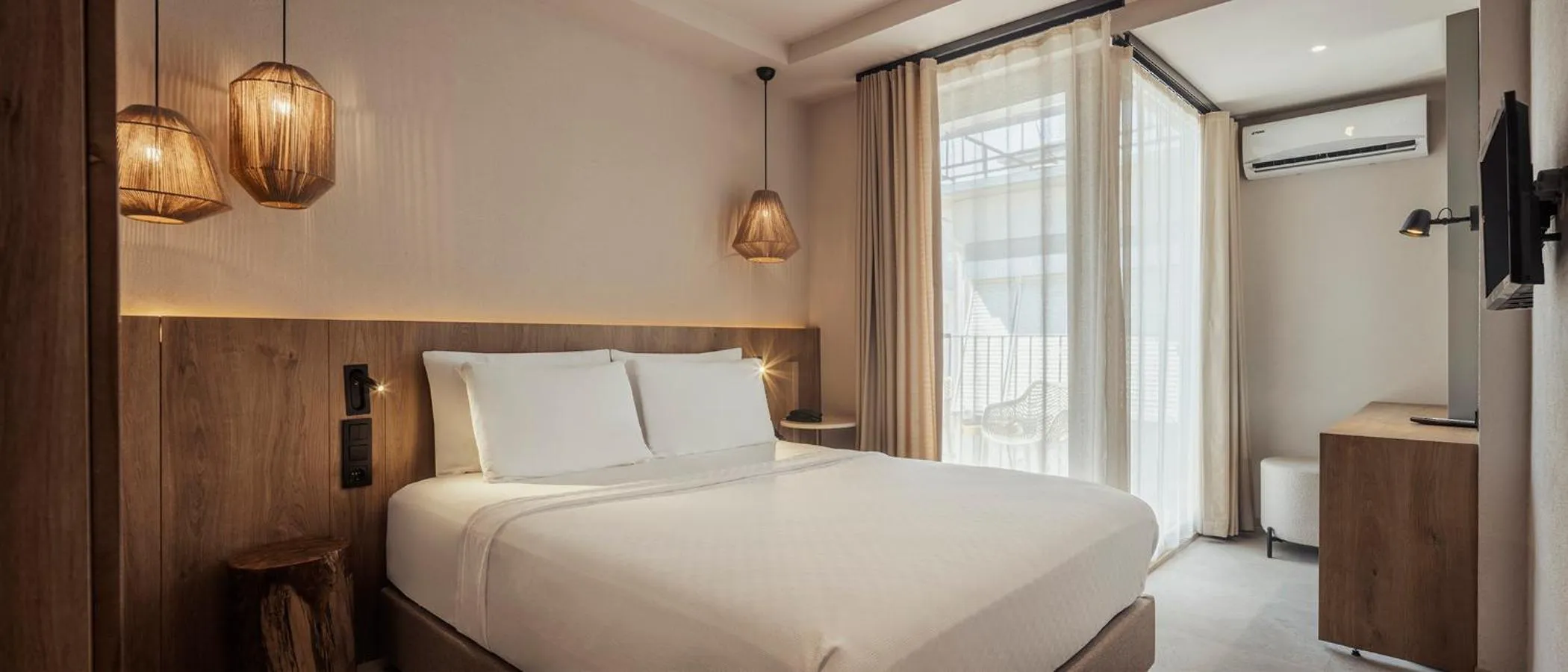 Bedroom, Bed in En Vie Beach Boutique Hotel - Adults Only