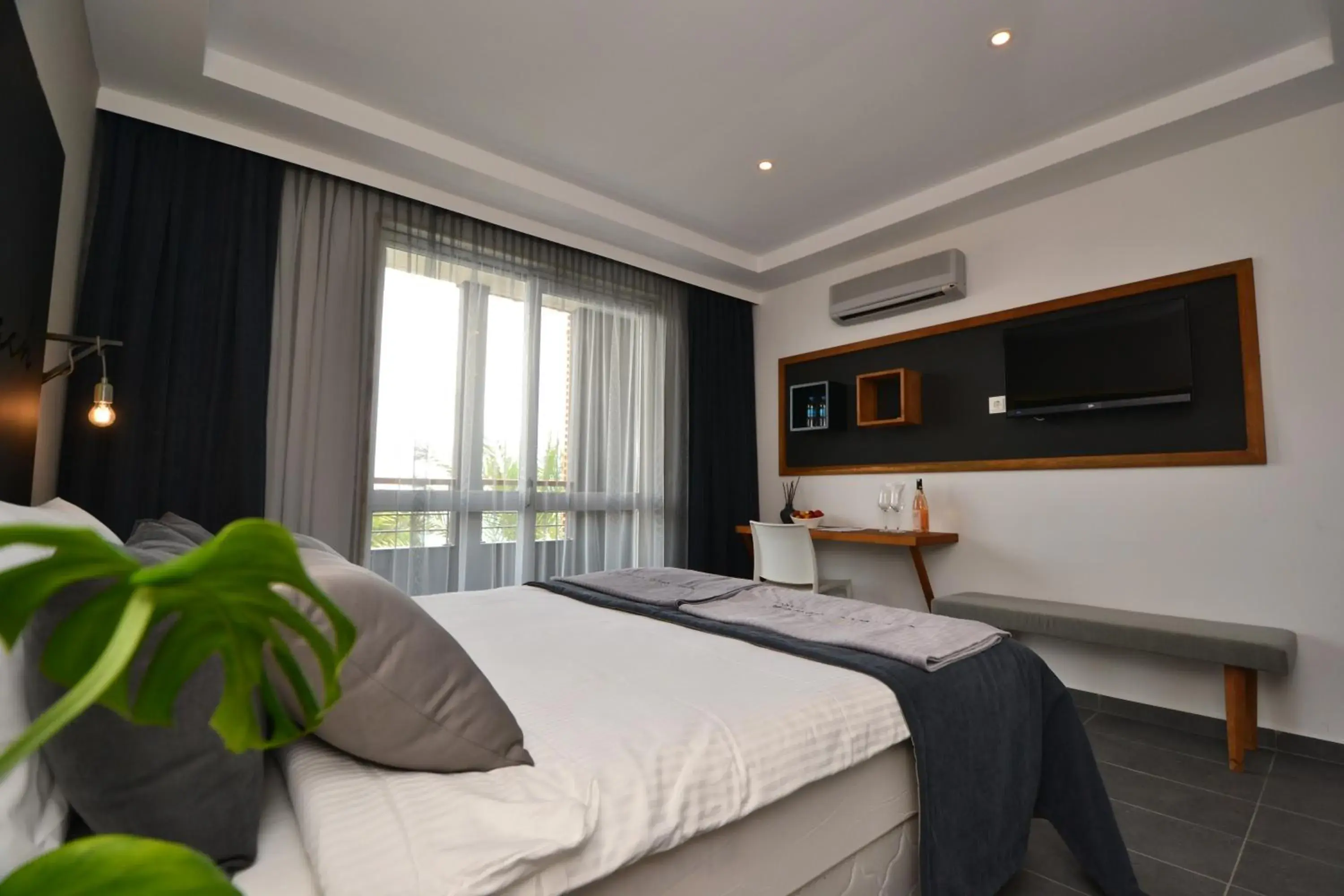 Photo of the whole room, Bed in En Vie Beach Boutique Hotel - Adults Only