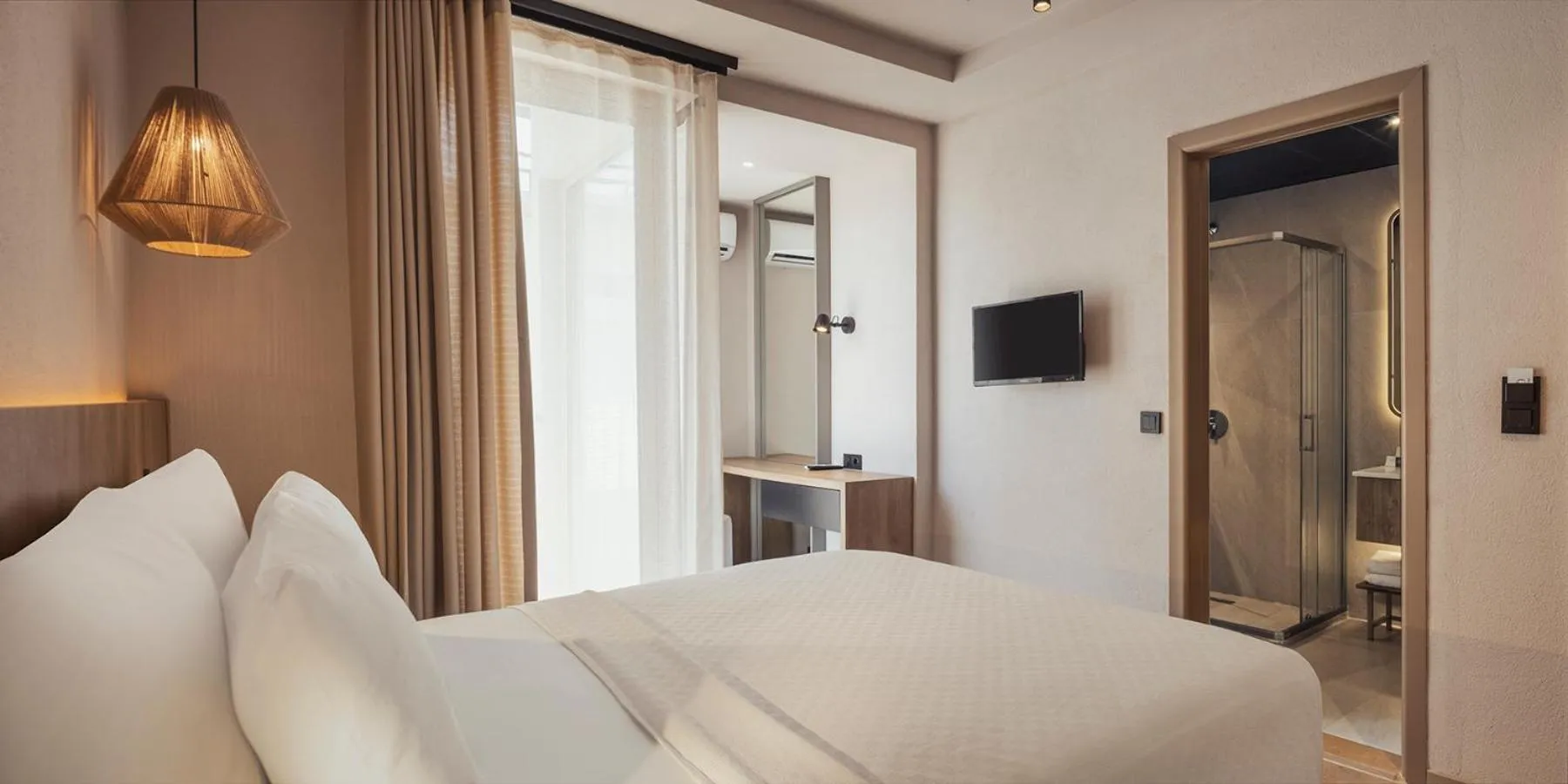 Photo of the whole room, Bed in En Vie Beach Boutique Hotel - Adults Only