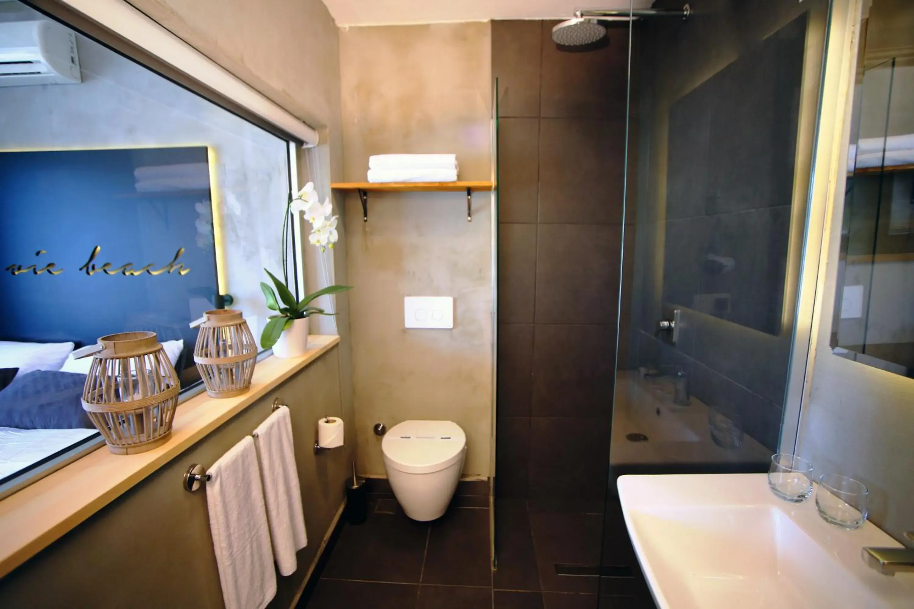 Toilet, Bathroom in En Vie Beach Boutique Hotel - Adults Only