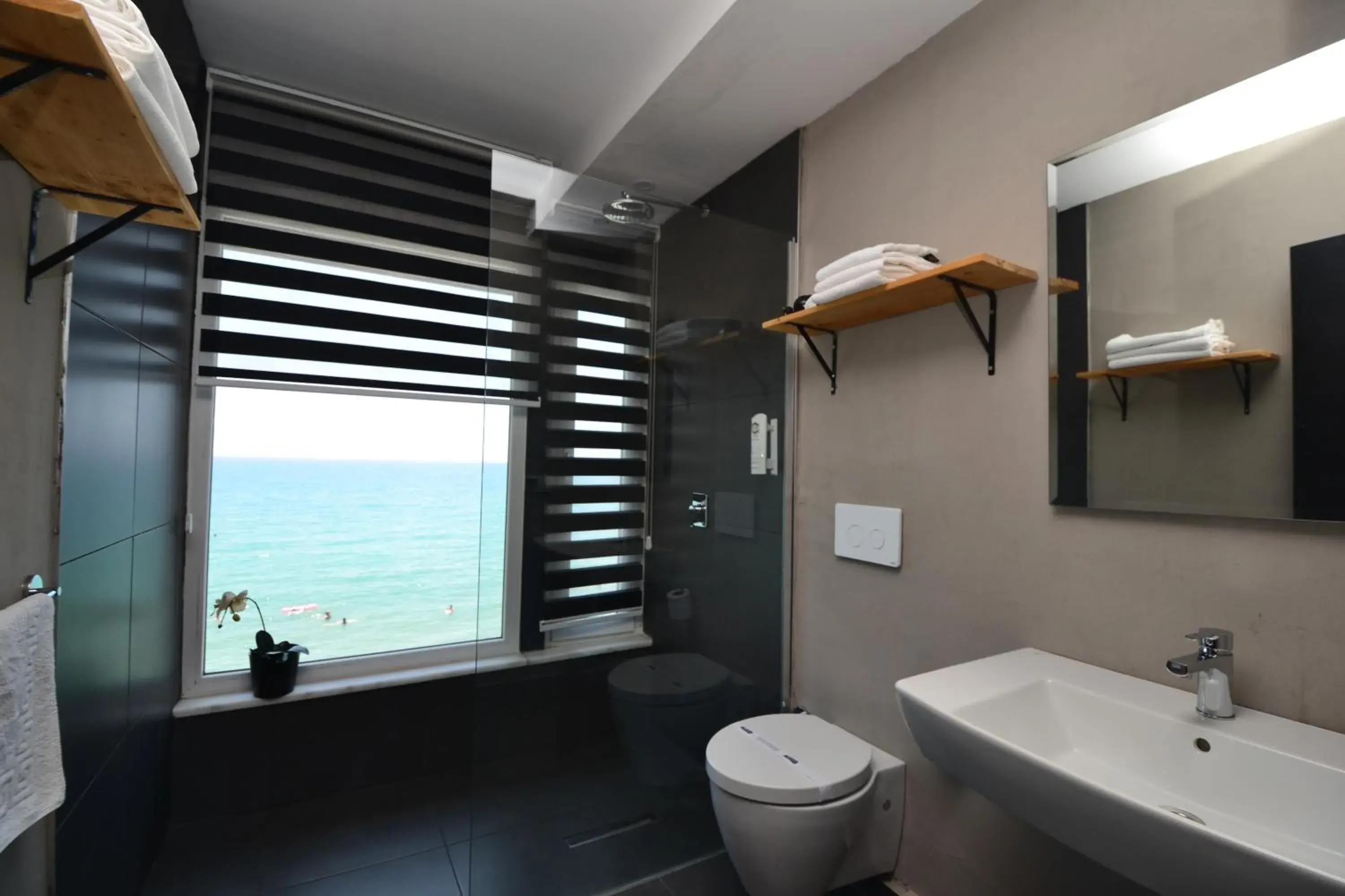 Toilet, Bathroom in En Vie Beach Boutique Hotel - Adults Only