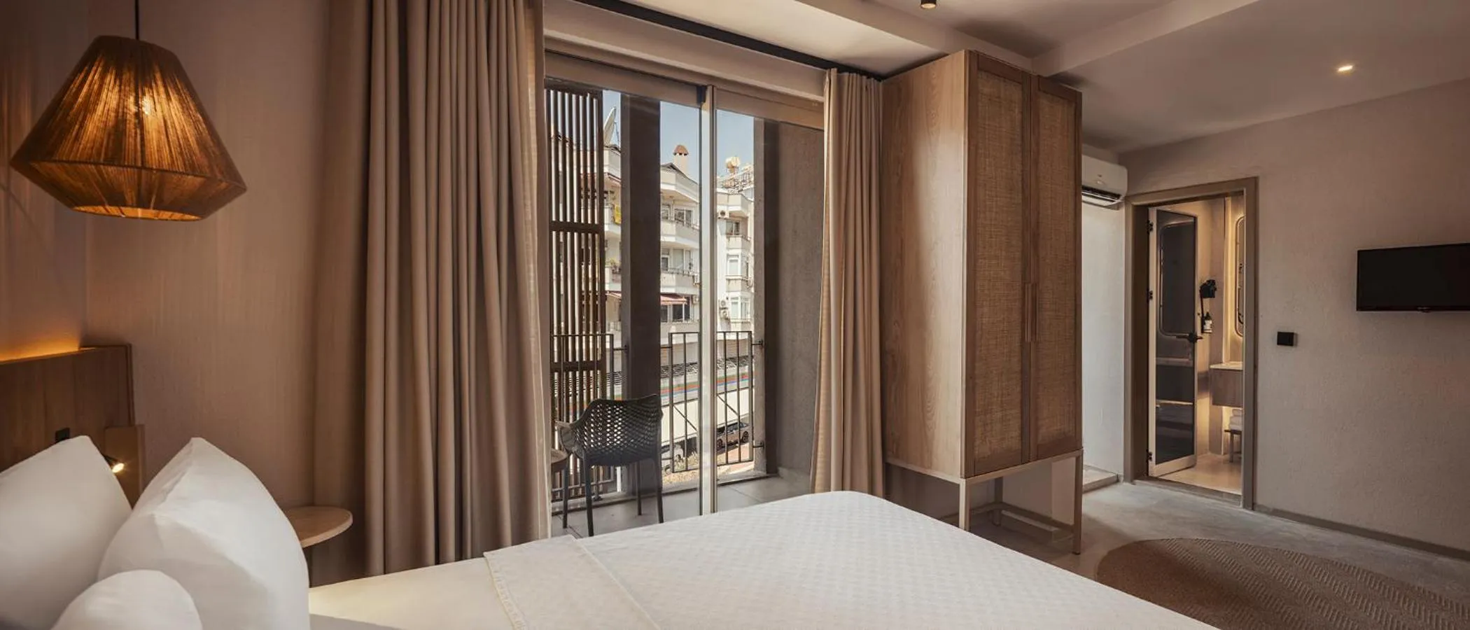 Photo of the whole room, Bed in En Vie Beach Boutique Hotel - Adults Only