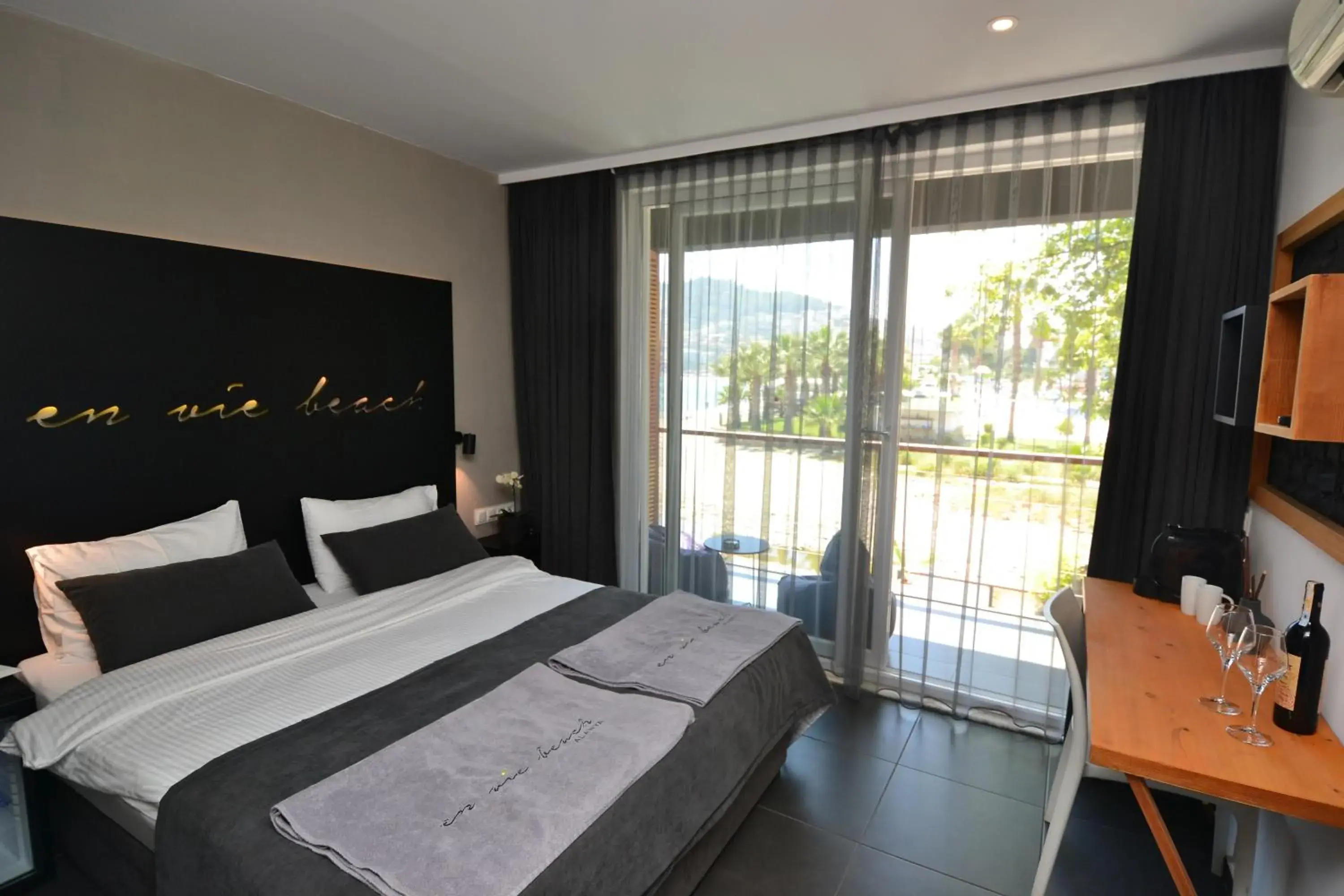 Bedroom, Bed in En Vie Beach Boutique Hotel - Adults Only