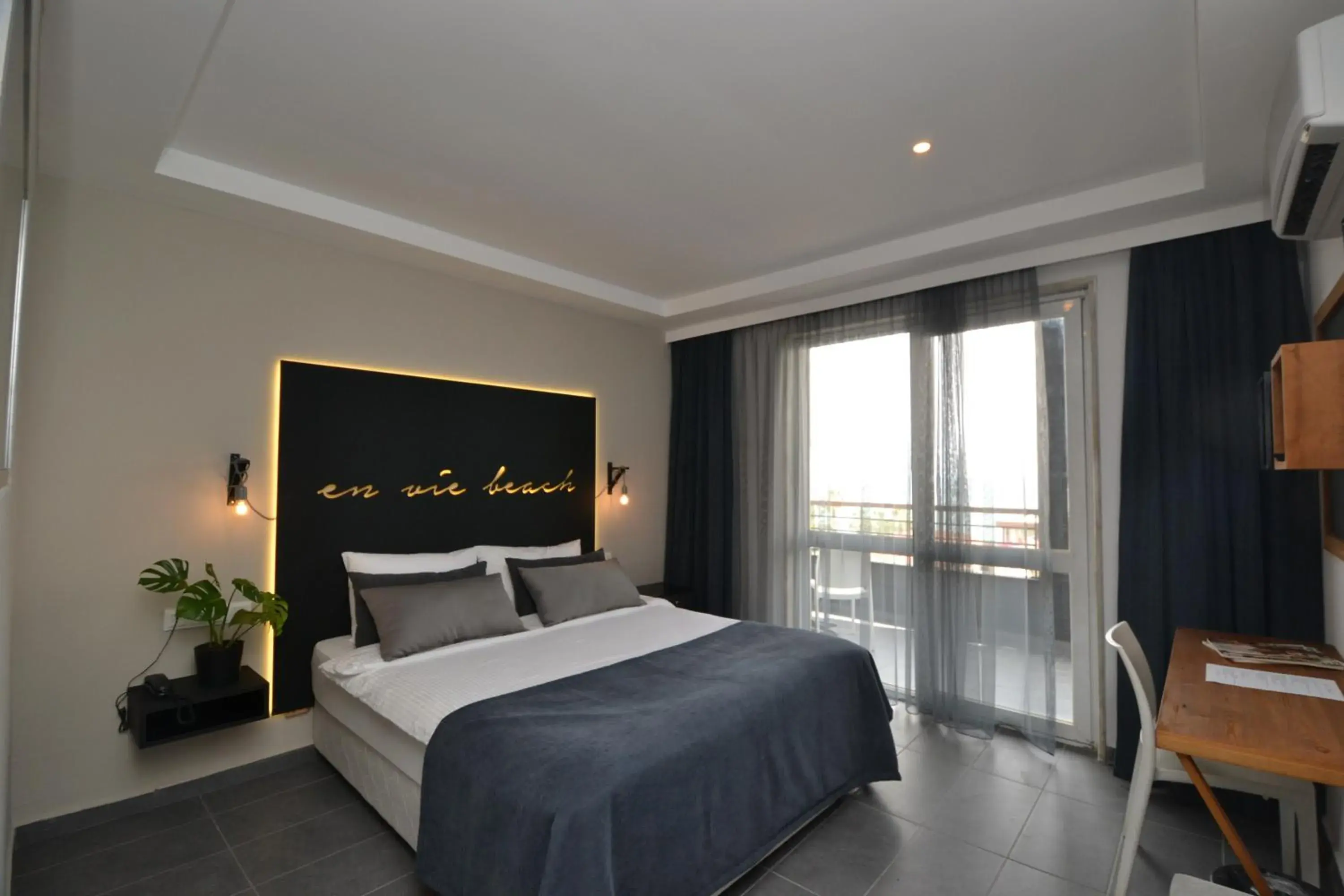 Photo of the whole room, Bed in En Vie Beach Boutique Hotel - Adults Only