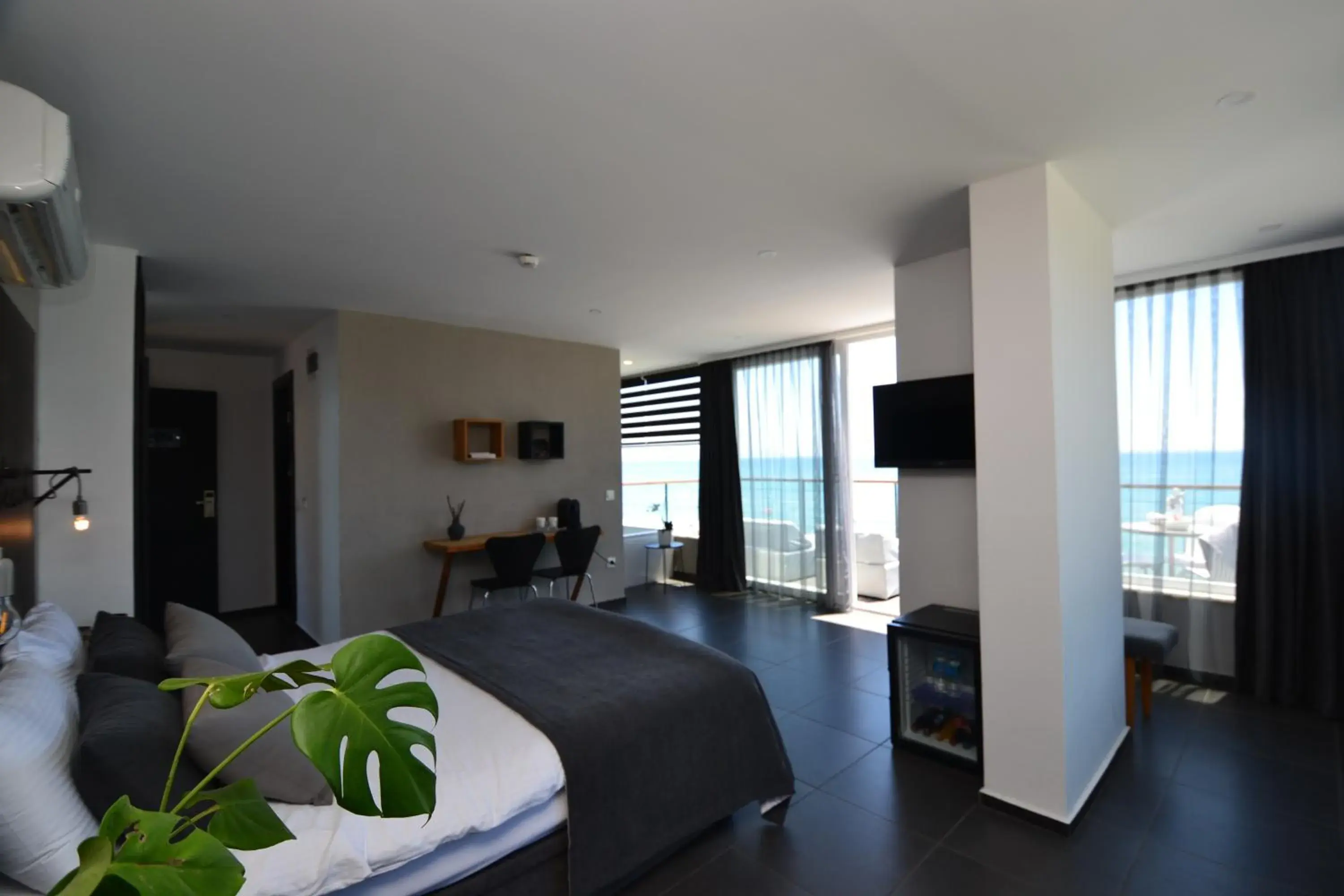 Bedroom, Bed in En Vie Beach Boutique Hotel - Adults Only