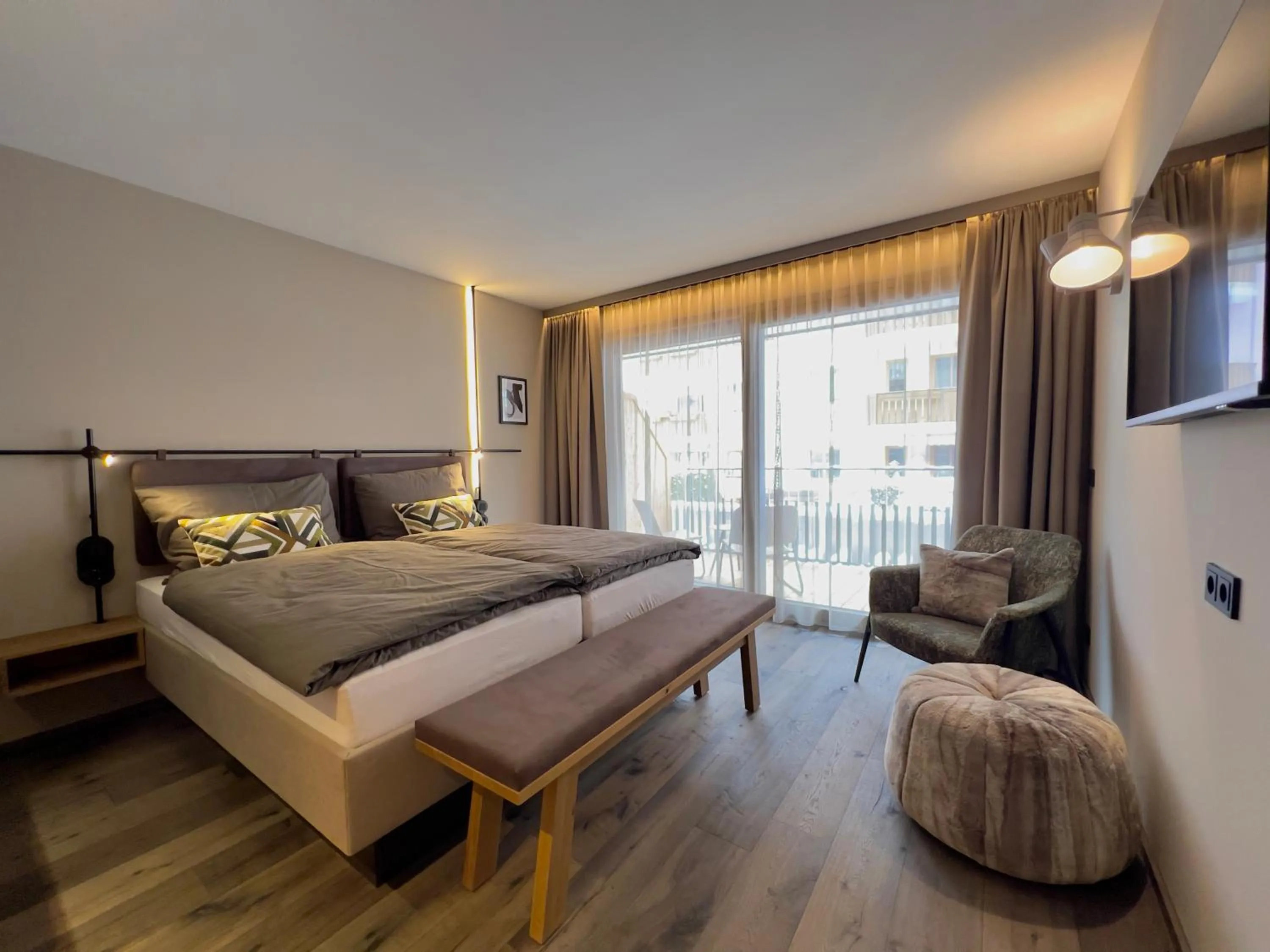 Photo of the whole room, Bed in Revier Boutique Hotel Kaprun