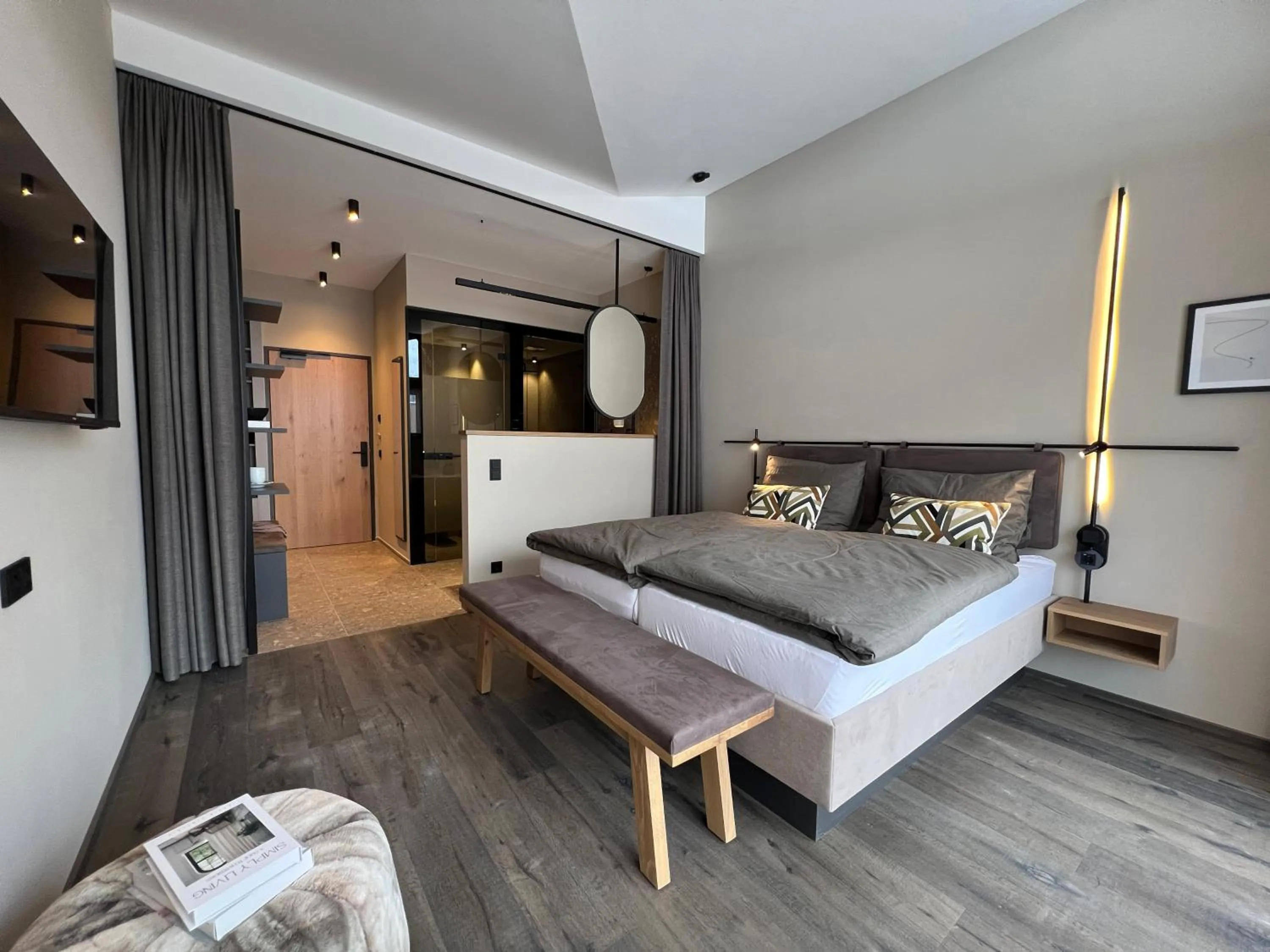 Photo of the whole room, Bed in Revier Boutique Hotel Kaprun