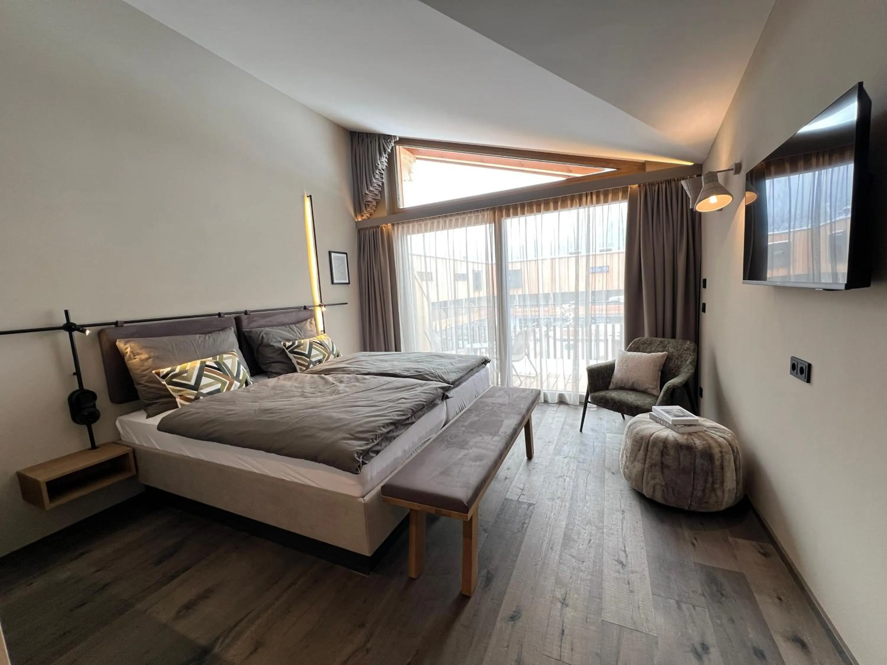 Photo of the whole room, Bed in Revier Boutique Hotel Kaprun