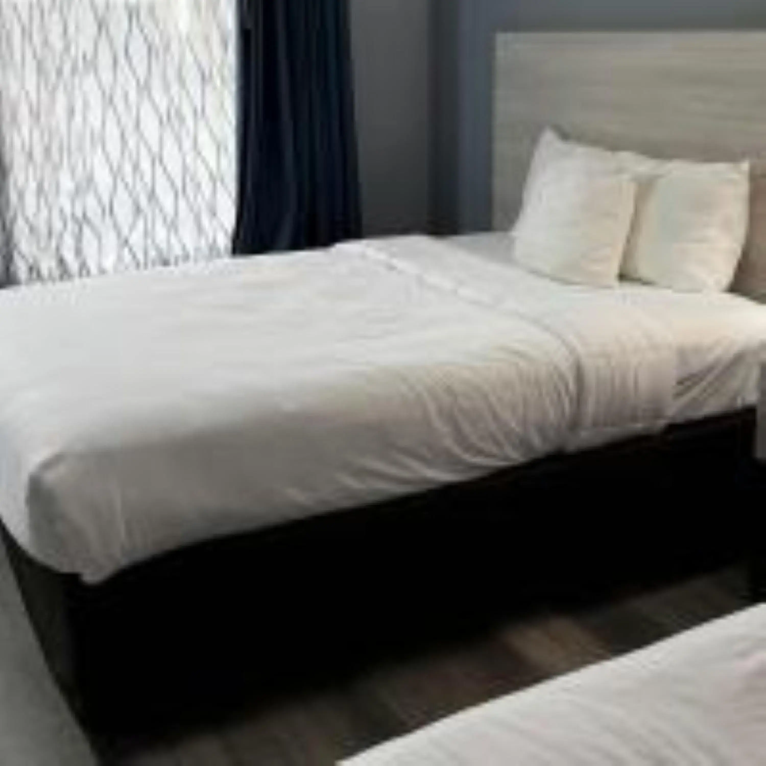 Bed in Suburban Studios Christiansburg - Blacksburg Bed in Suburban Studios Christiansburg - Blacksburg