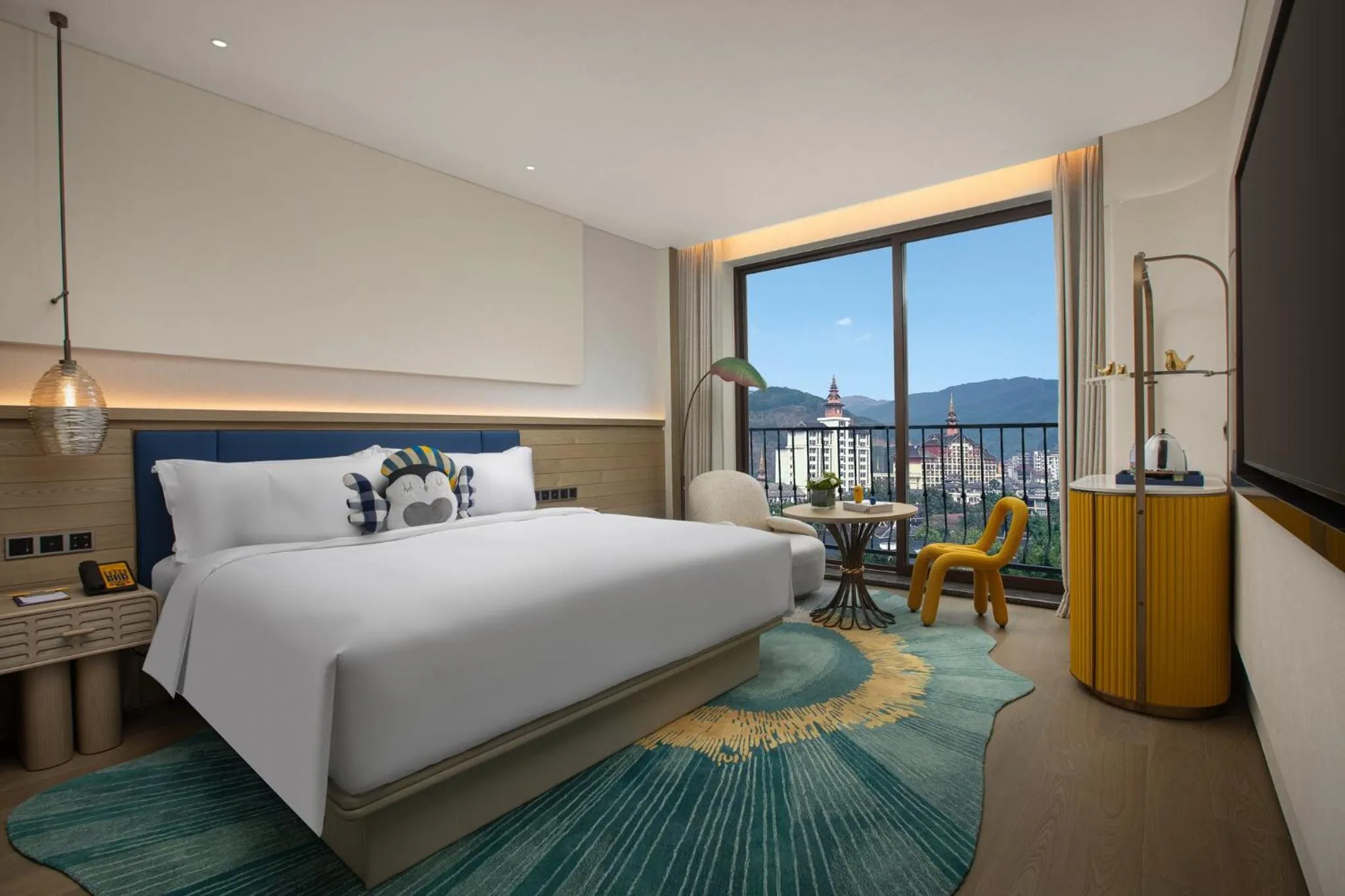 Photo of the whole room, Bed in voco Xishuangbanna Gaozhuang by IHG